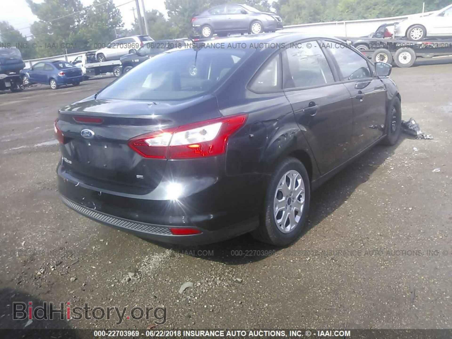 2012 Ford Focus - VIN: 1FAHP3F21CL349489 - Photo 4