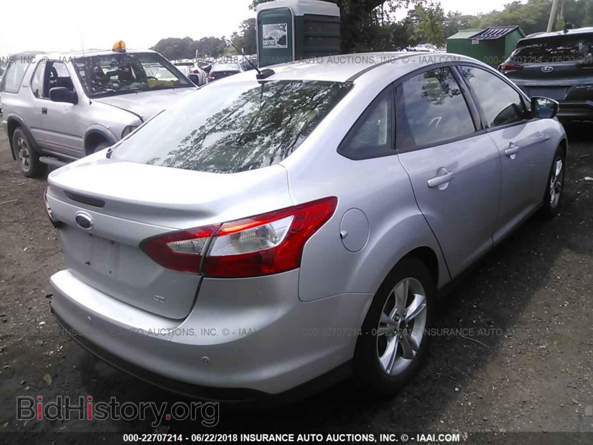 2014 Ford Focus - VIN: 1FADP3F28EL243204 - Фото 4