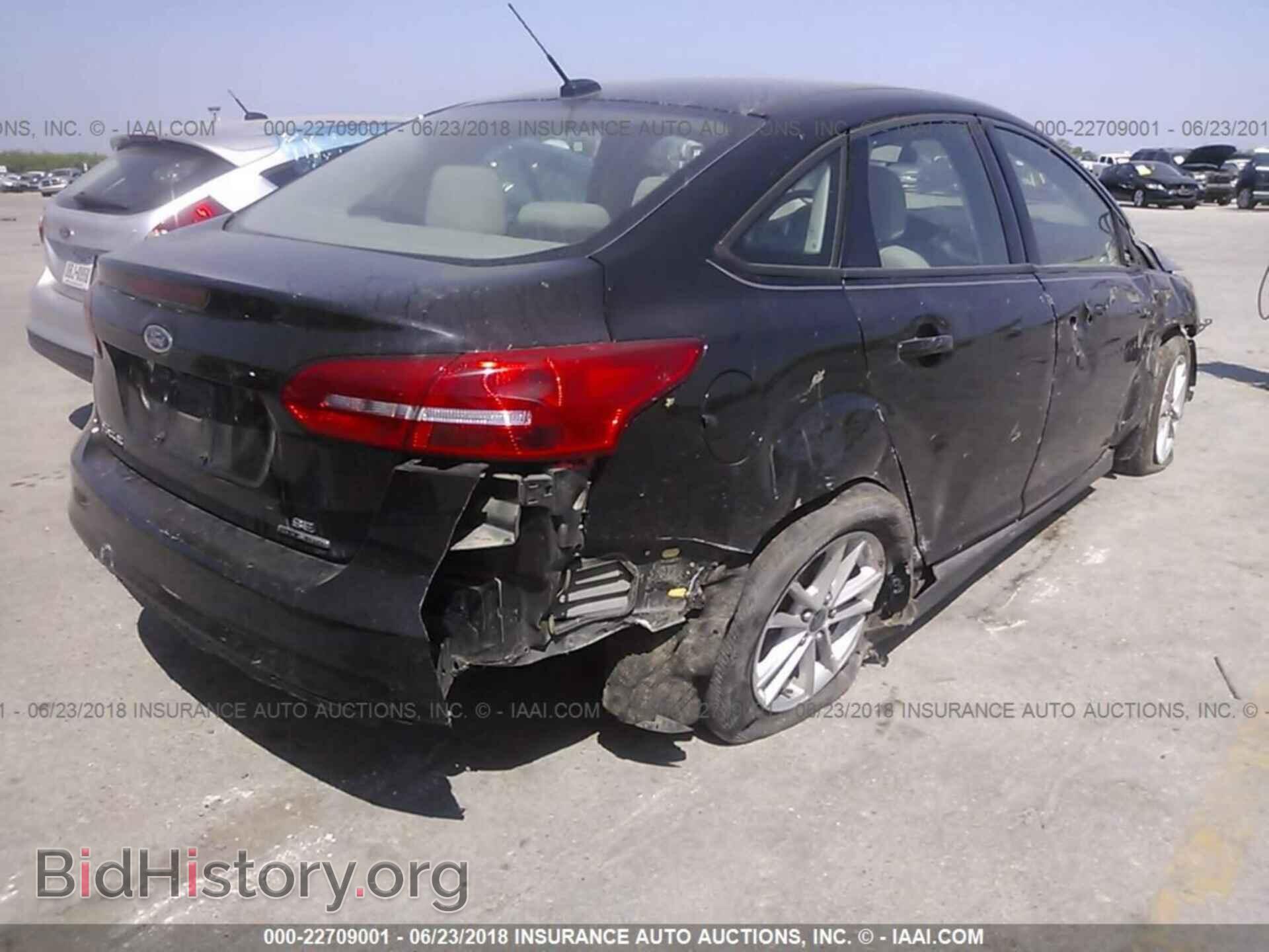 2015 Ford Focus - VIN: 1FADP3F25FL259474 - Photo 4