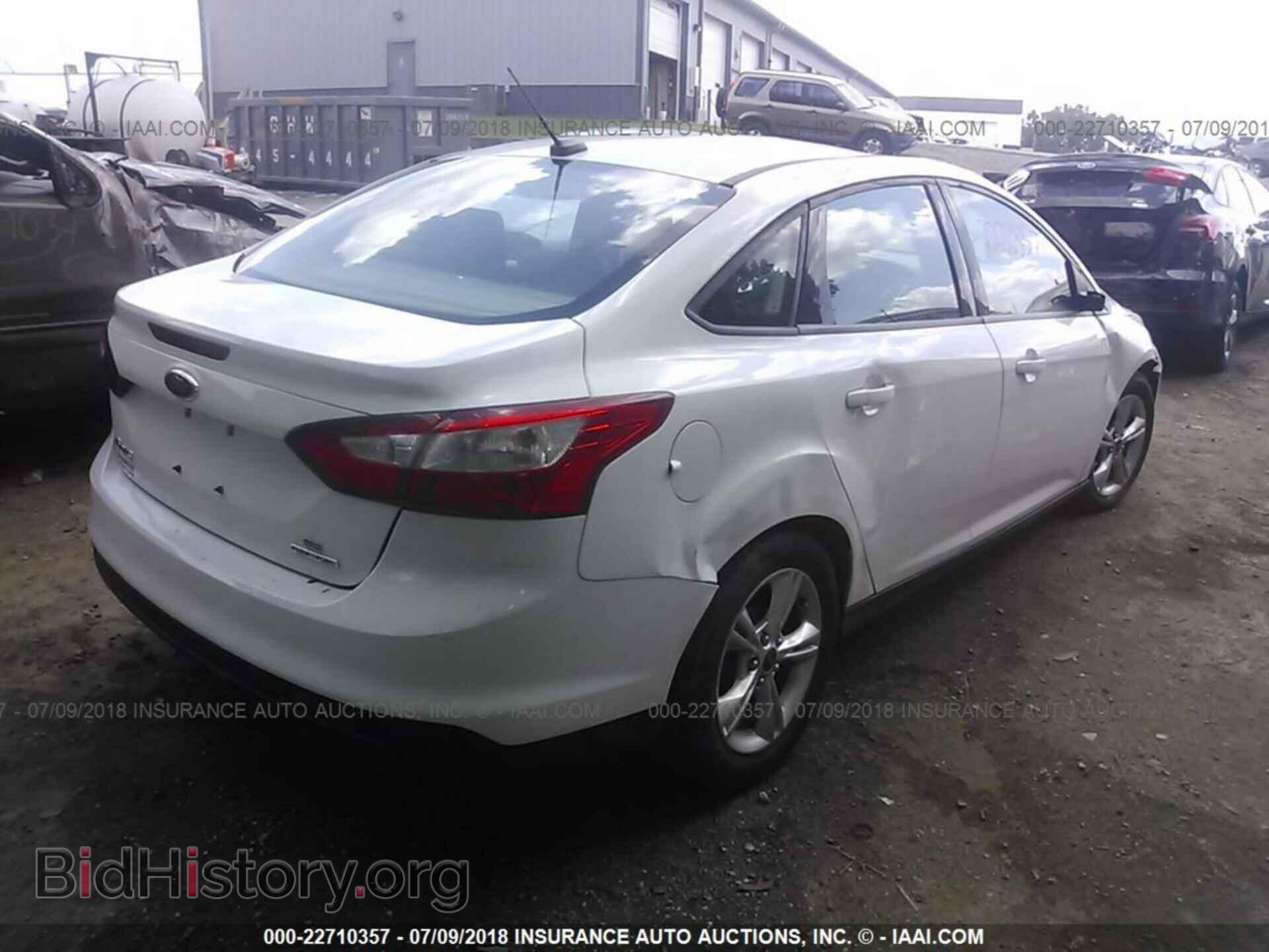 2014 Ford Focus - VIN: 1FADP3F25EL225548 - Photo 4