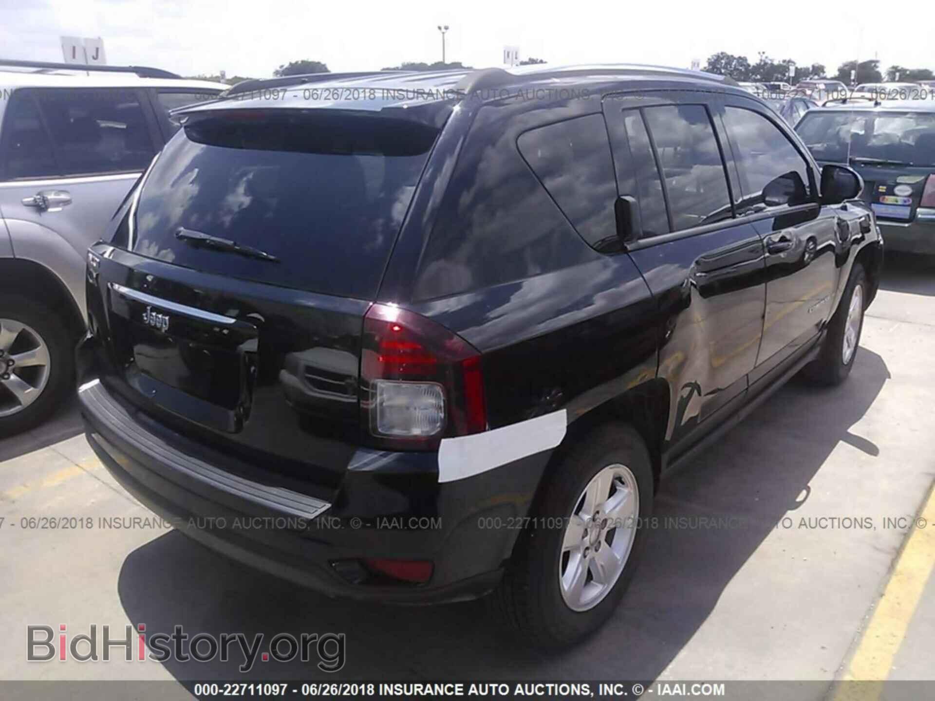 2014 Jeep Compass - VIN: 1C4NJCBA7ED545252 - Photo 4