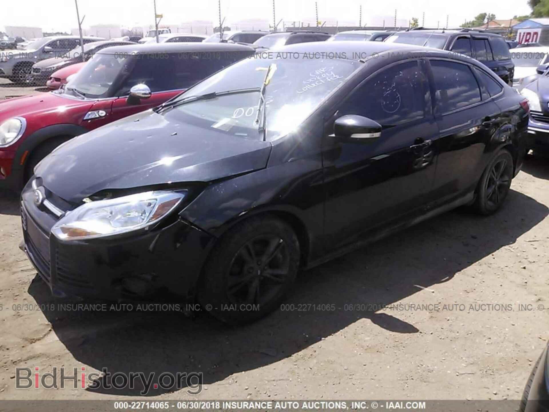 2014 Ford Focus - VIN: 1FADP3F21EL390772 - Фото 2