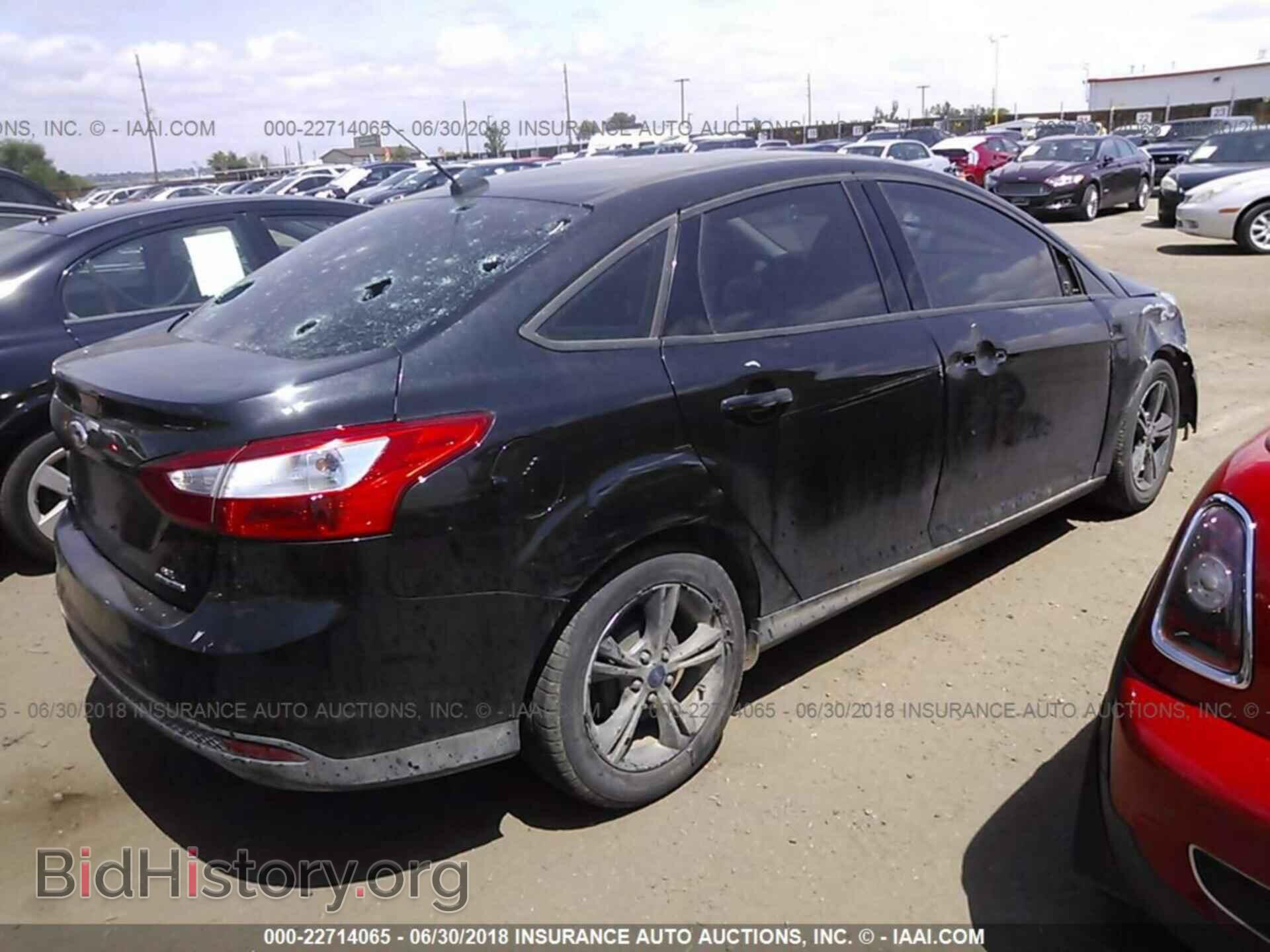 2014 Ford Focus - VIN: 1FADP3F21EL390772 - Фото 4
