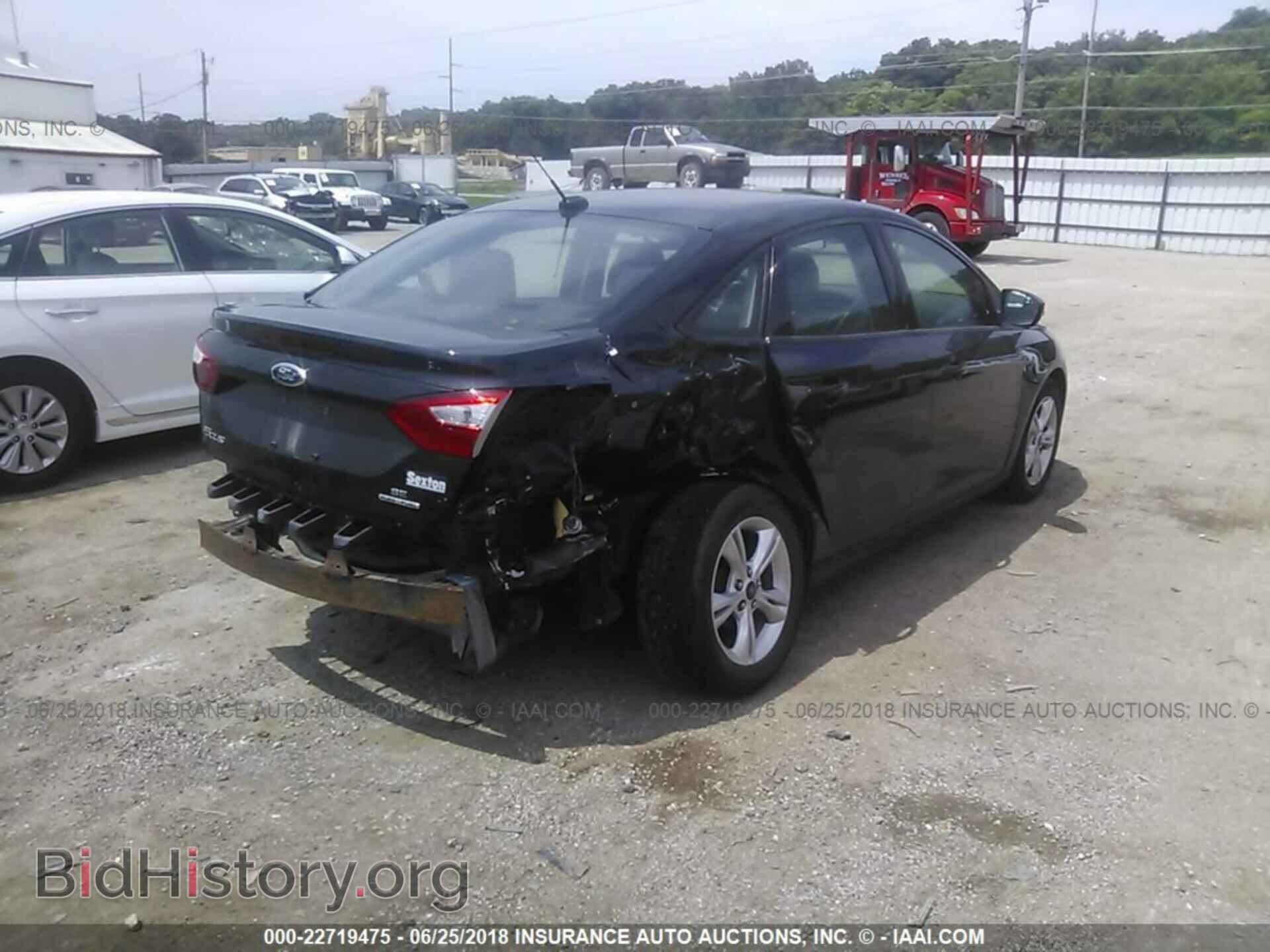 2014 Ford Focus - VIN: 1FADP3F20EL222721 - Фото 4