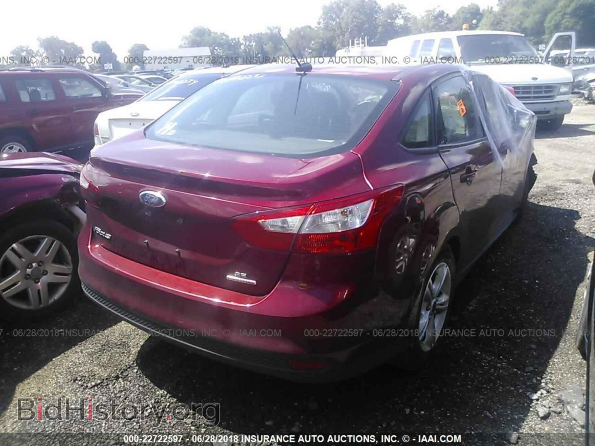 2014 Ford Focus - VIN: 1FADP3F20EL369573 - Photo 4