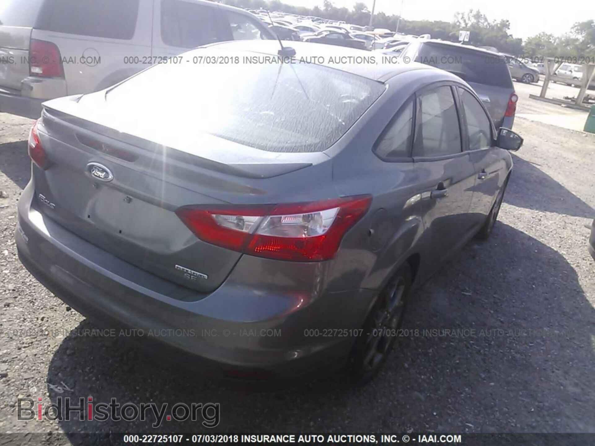 2014 Ford Focus - VIN: 1FADP3F26EL106830 - Photo 4