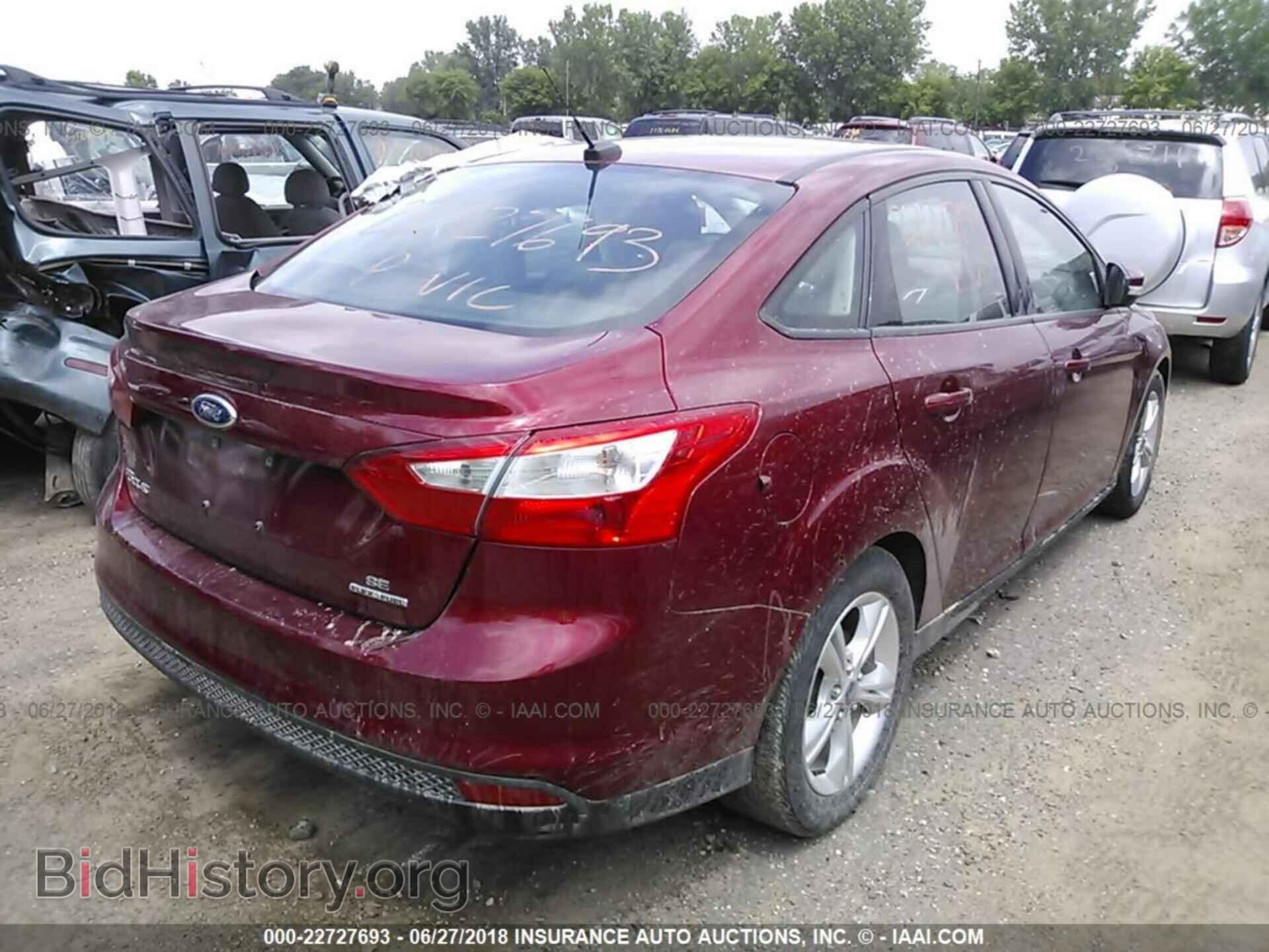 2014 Ford Focus - VIN: 1FADP3F25EL346788 - Photo 4