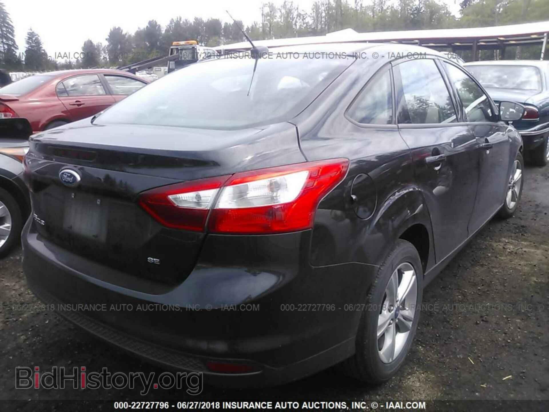 2013 Ford Focus - VIN: 1FADP3F28DL268117 - Photo 4