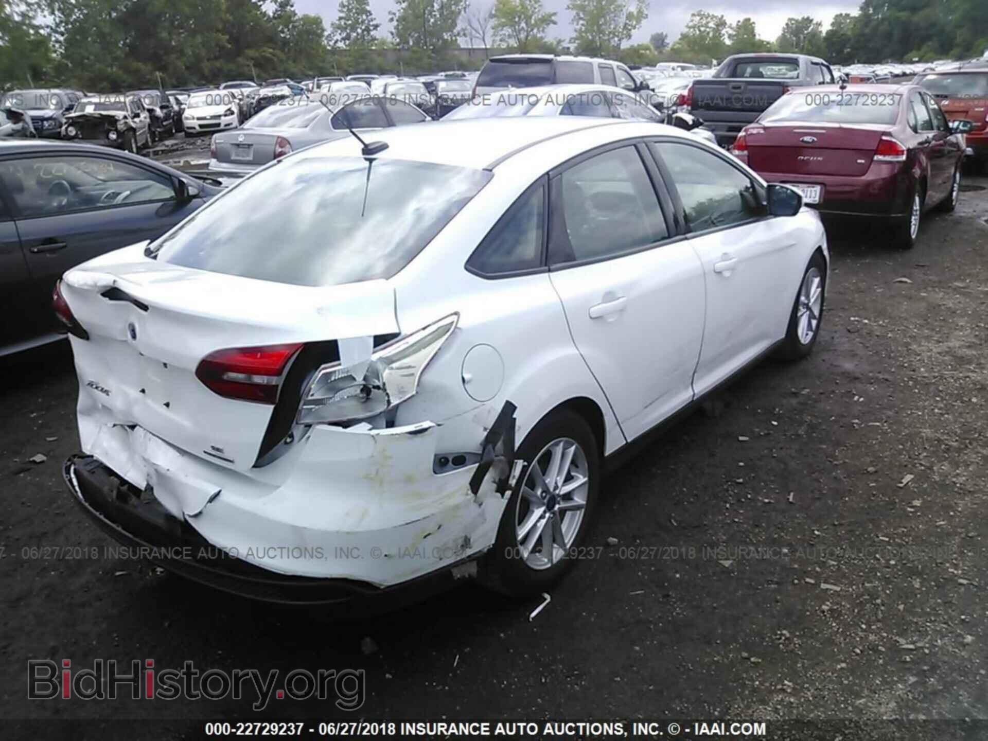 2016 Ford Focus - VIN: 1FADP3F23GL309662 - Photo 4
