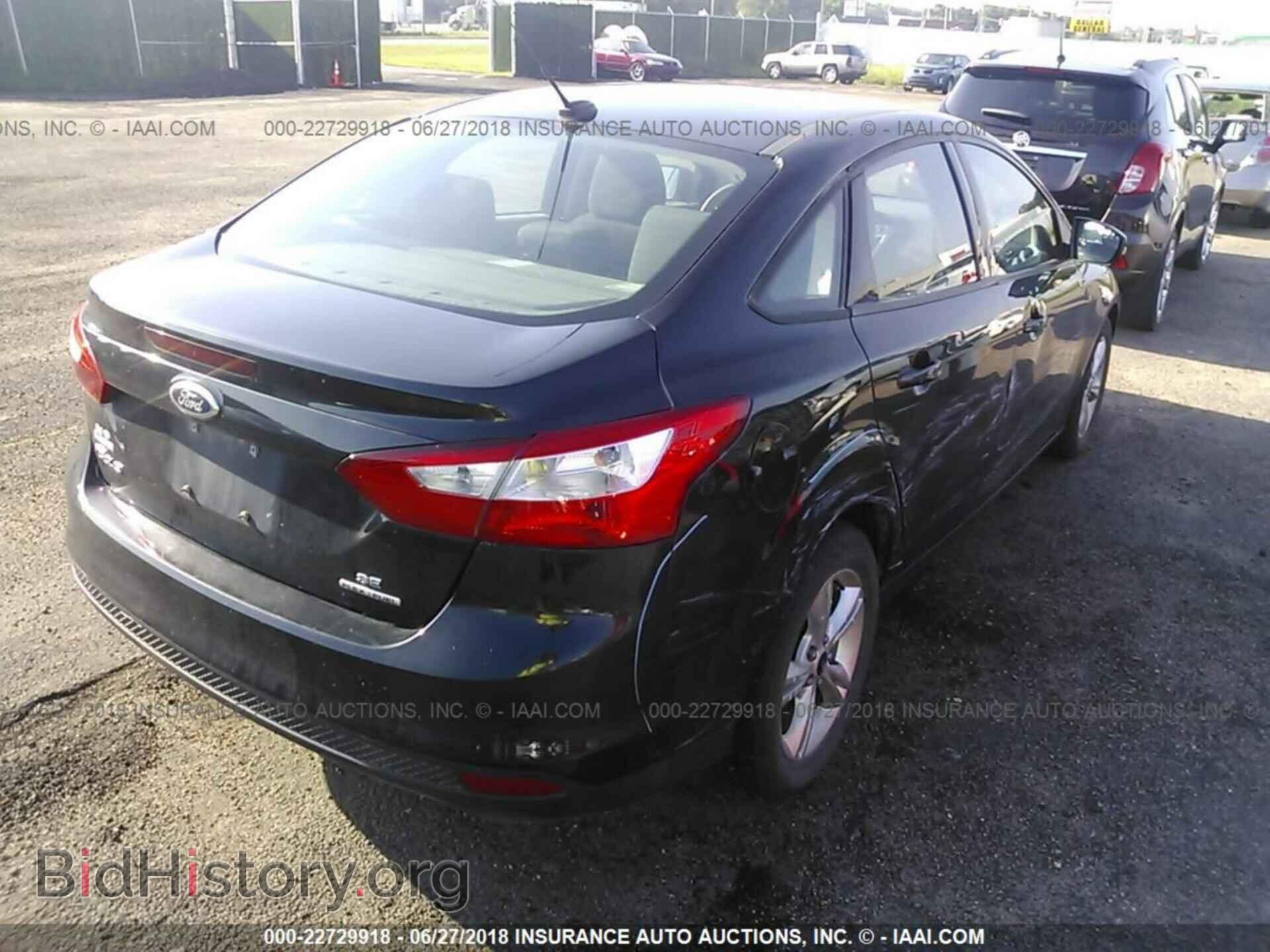 2013 Ford Focus - VIN: 1FADP3F24DL296027 - Photo 4