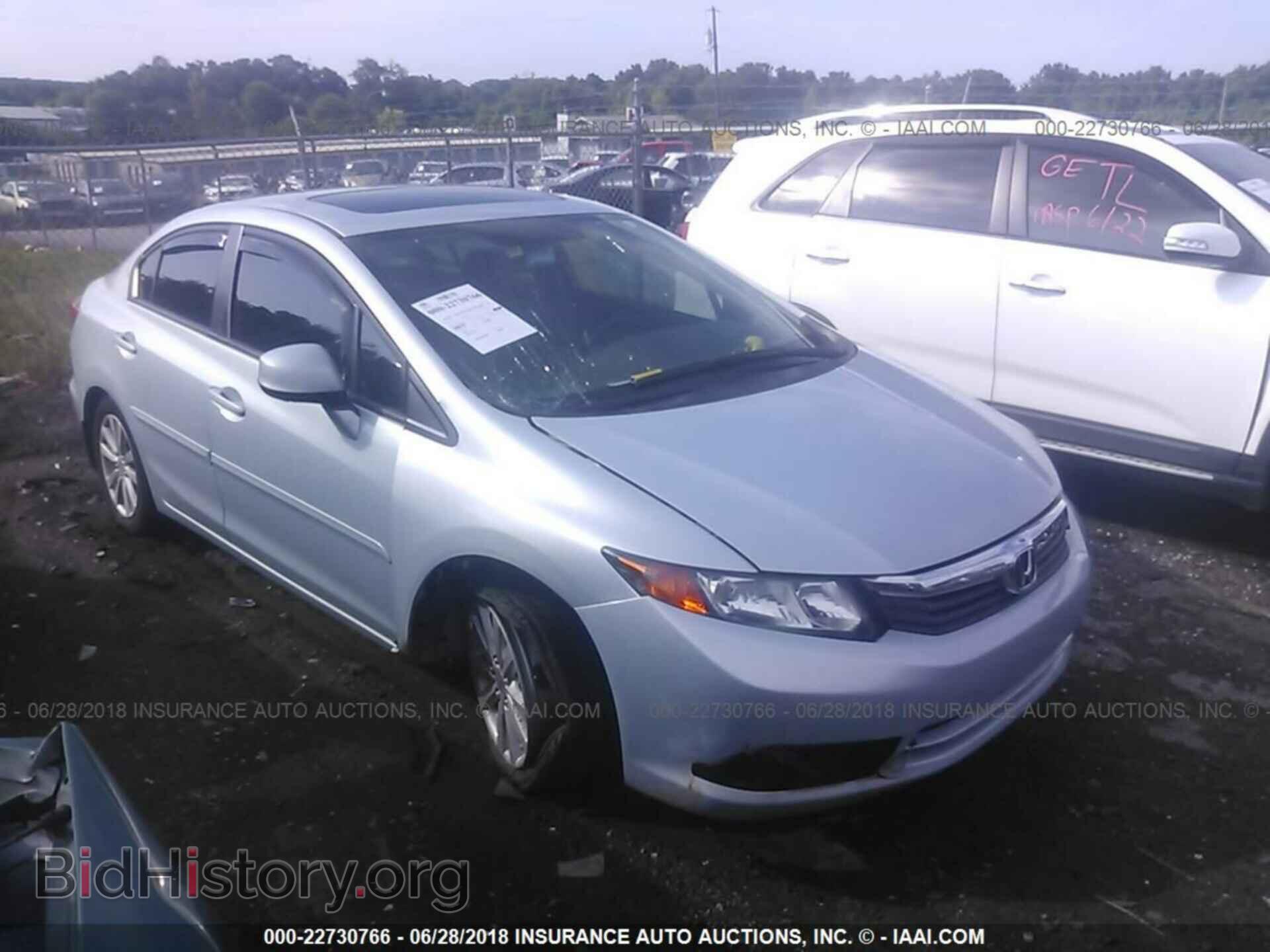 2012 Honda CIVIC (VIN 2HGFB2F95CH546090) — фото 1 из 10, IAAI, повреждение: правая передняя часть