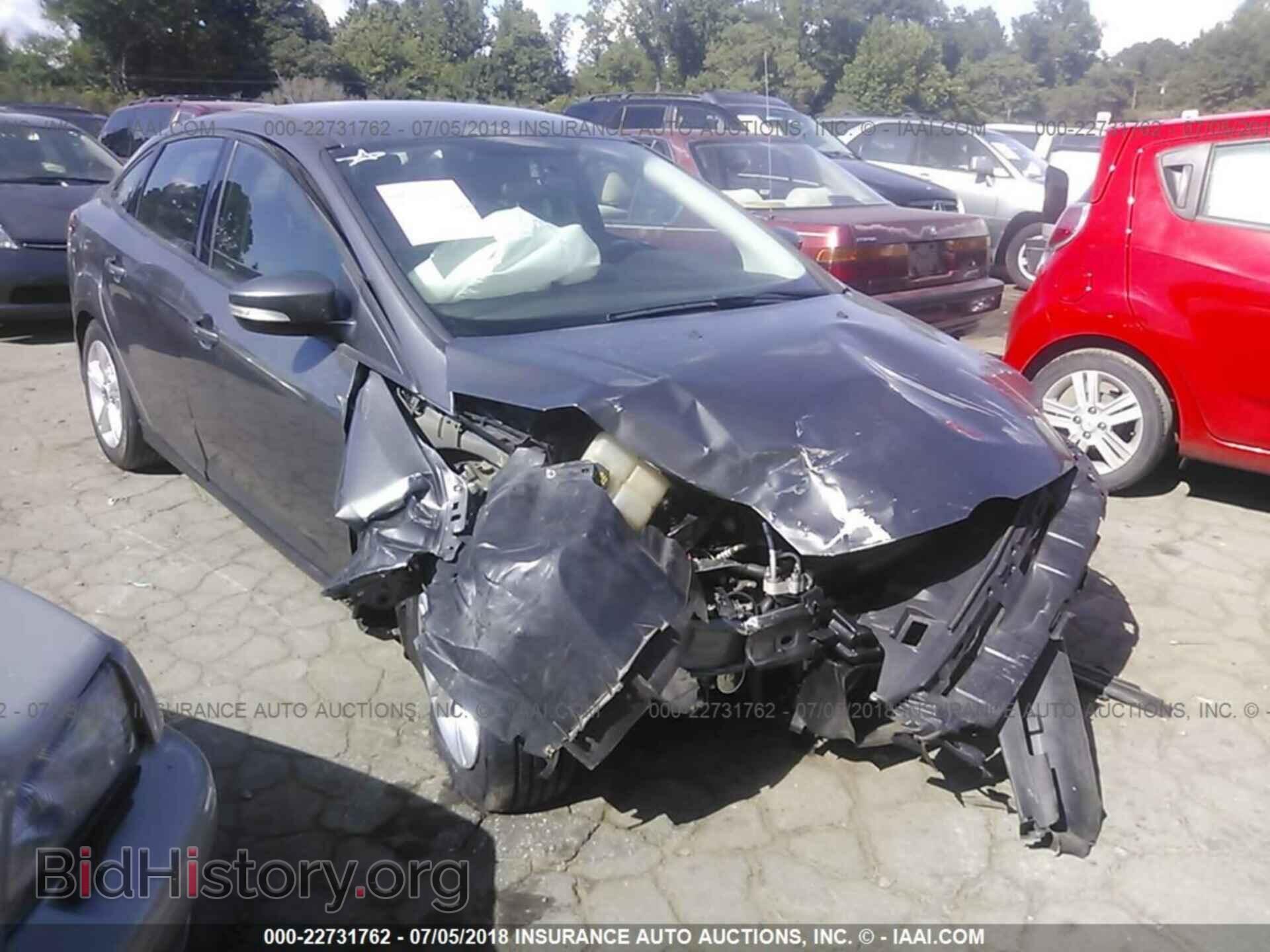 Фотография 1FADP3F22EL129327 - Ford Focus 2014