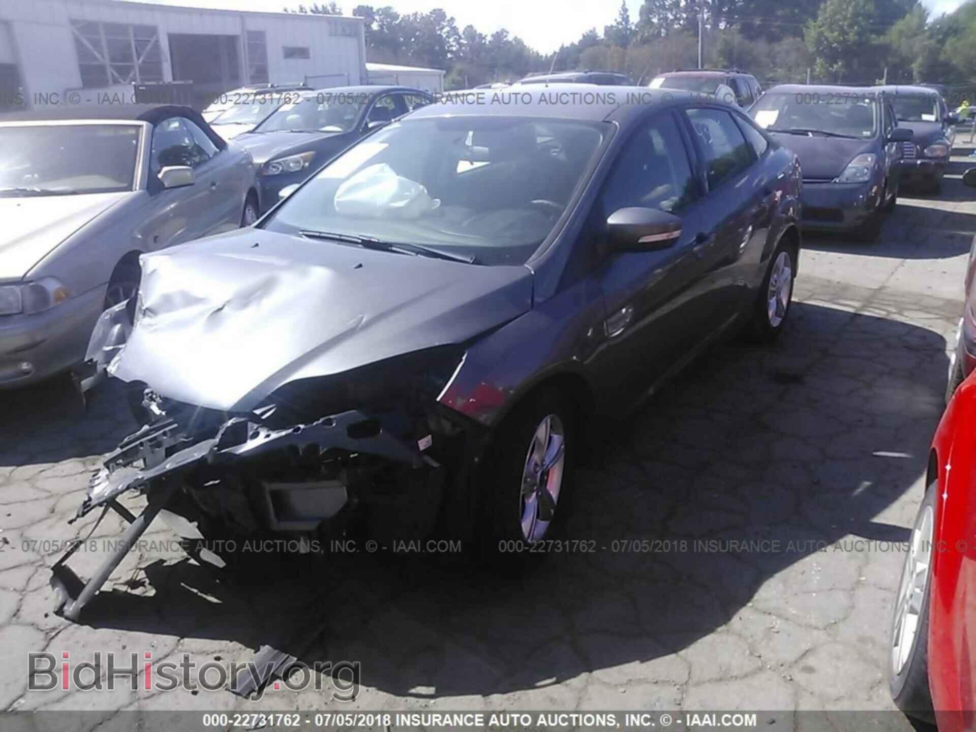 2014 Ford Focus - VIN: 1FADP3F22EL129327 - Фото 2