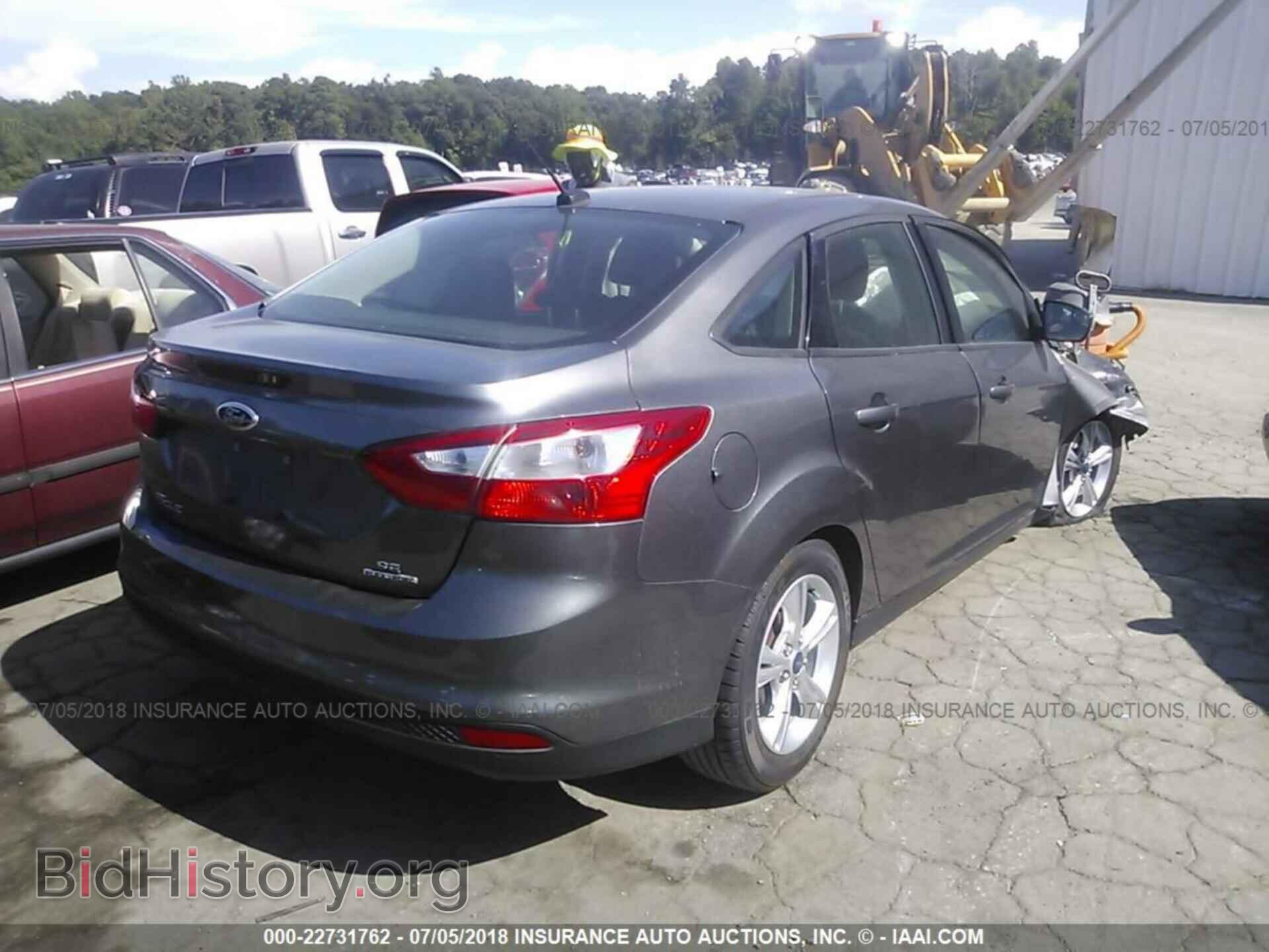 2014 Ford Focus - VIN: 1FADP3F22EL129327 - Фото 4
