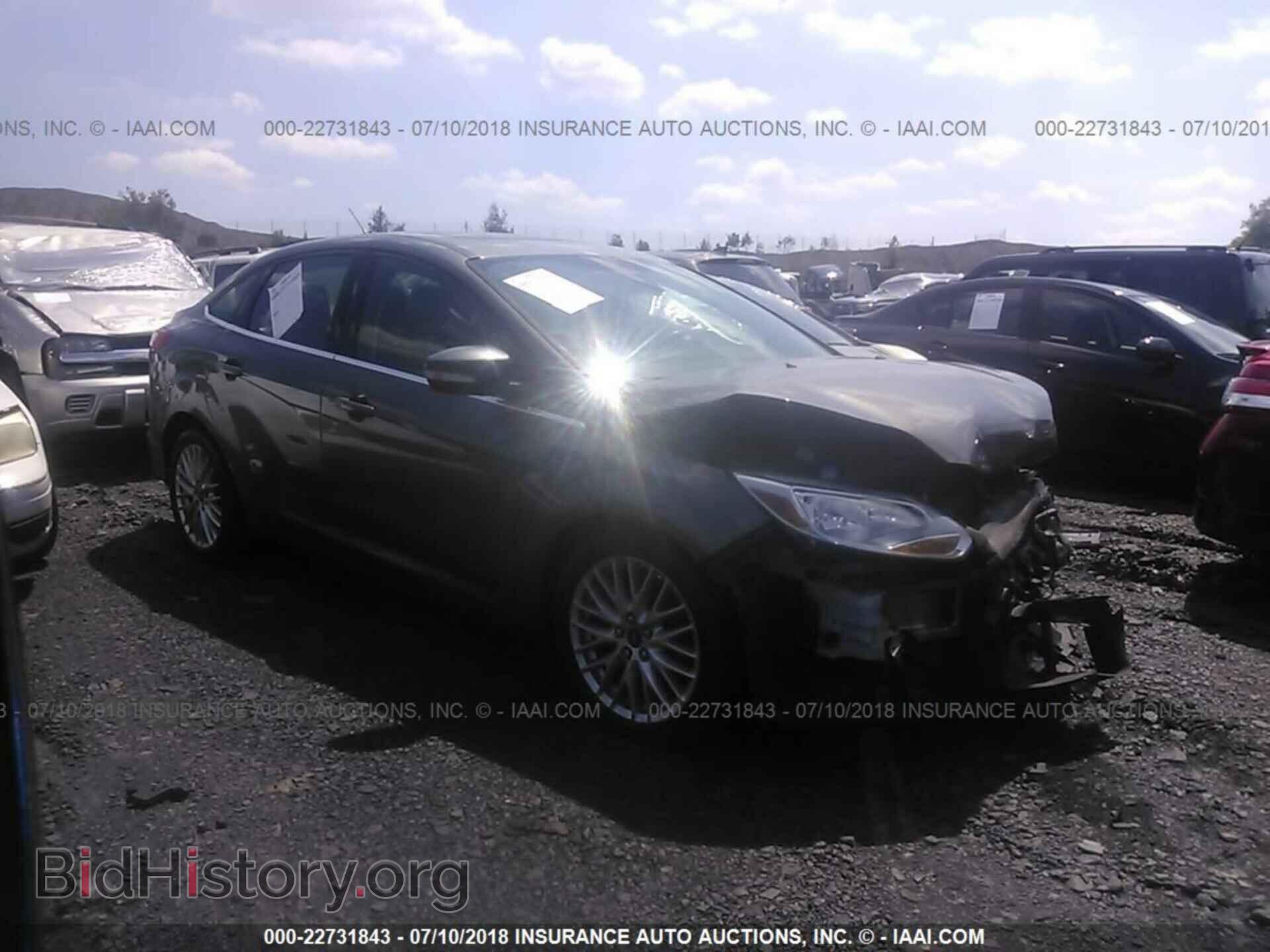 Photo 1FAHP3H24CL306682 - Ford Focus 2012