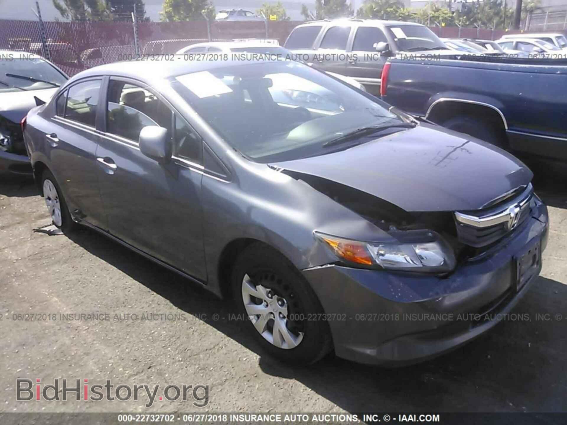 2012 Honda CIVIC (VIN 2HGFB2F56CH566006) — фото 1 из 10, IAAI, повреждение: передняя и задняя часть