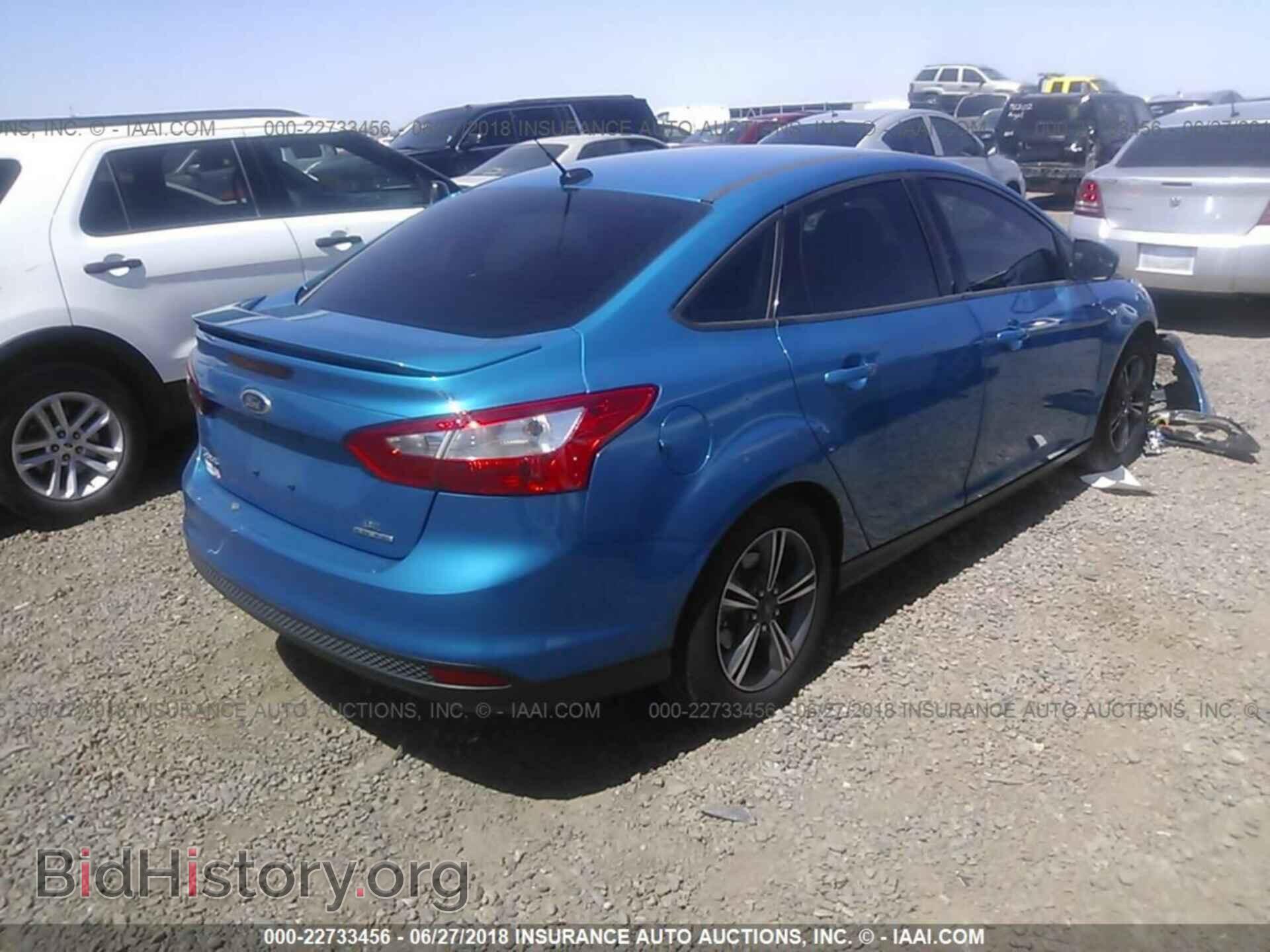 2014 Ford Focus - VIN: 1FADP3F20EL341532 - Photo 4