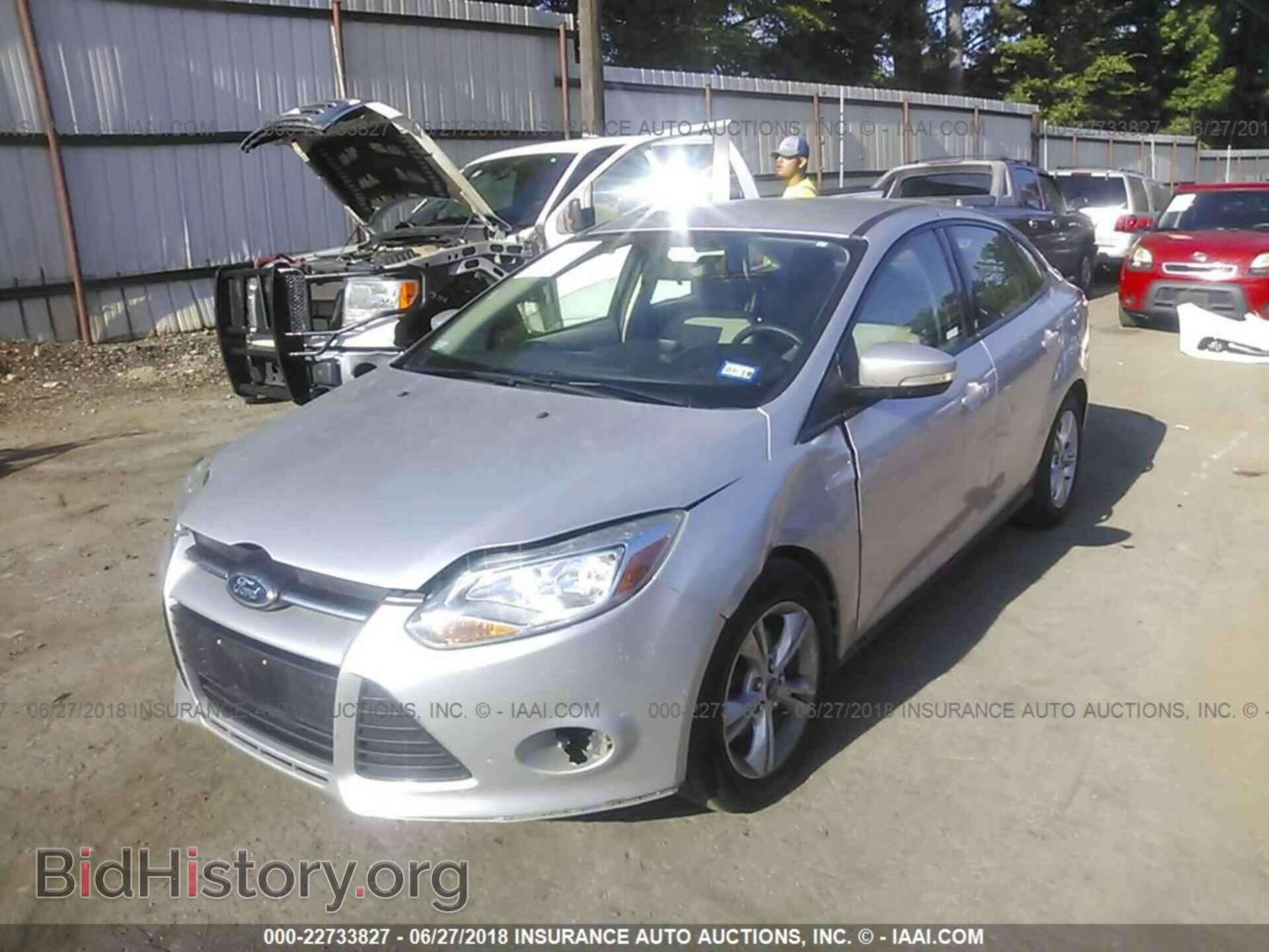 2014 Ford Focus - VIN: 1FADP3F21EL108744 - Фото 2