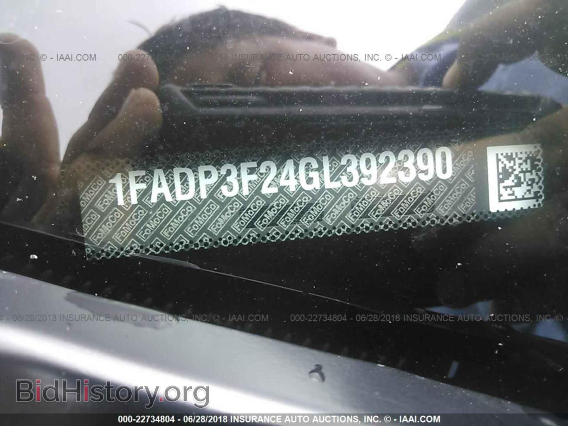 2016 Ford Focus - VIN: 1FADP3F24GL392390 - Photo 9