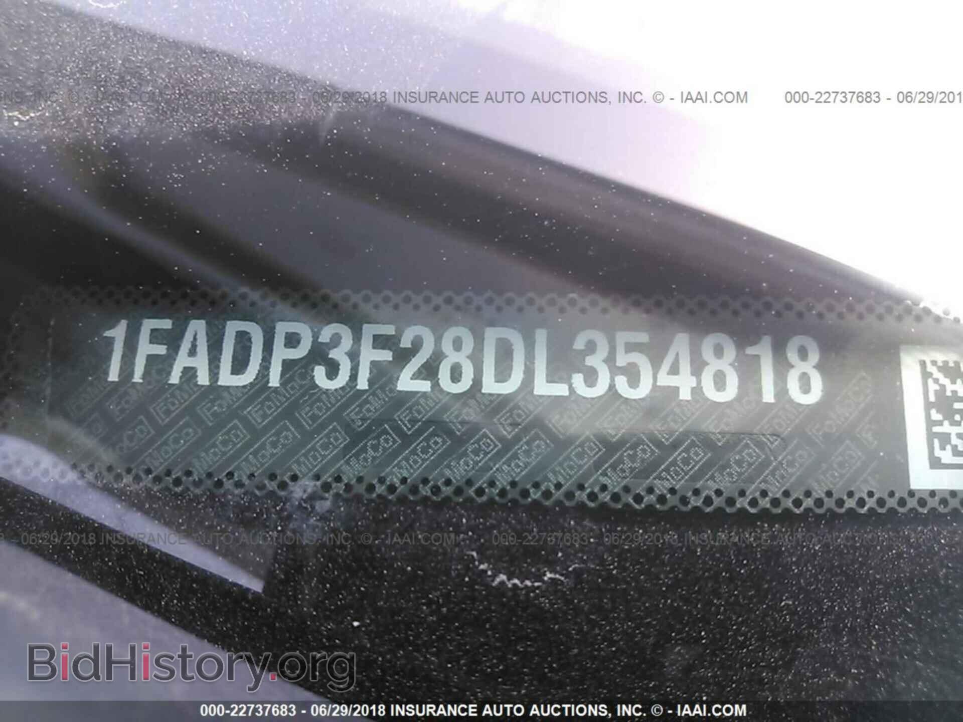 2013 Ford Focus - VIN: 1FADP3F28DL354818 - Photo 9