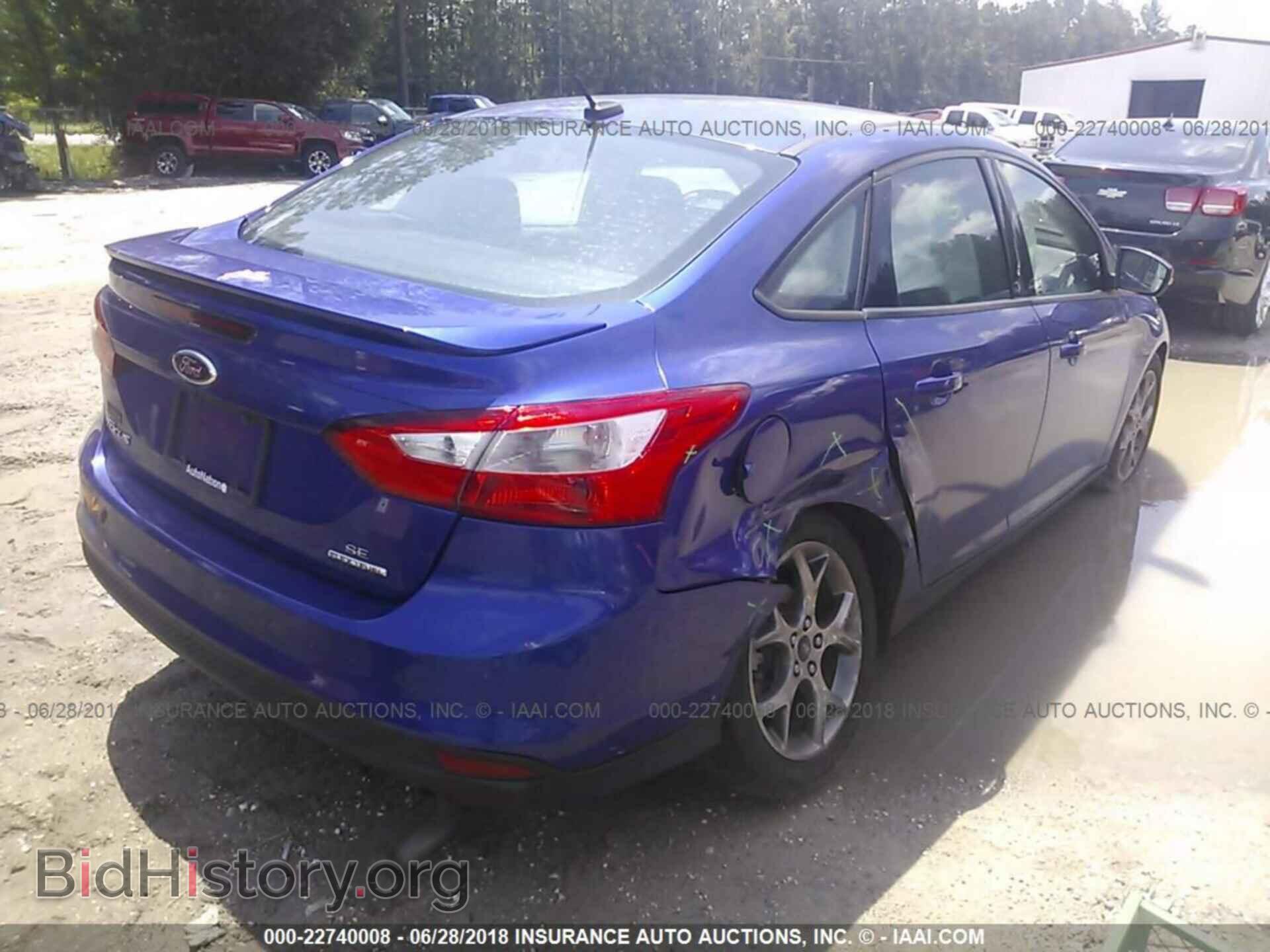 2014 Ford Focus - VIN: 1FADP3F23EL309593 - Фото 4