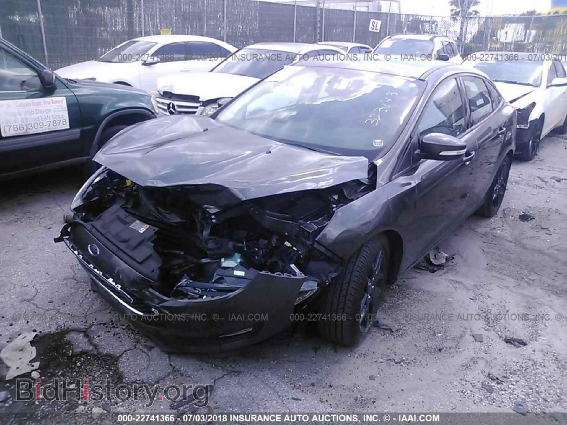 2016 Ford Focus - VIN: 1FADP3F20GL323843 - Photo 2