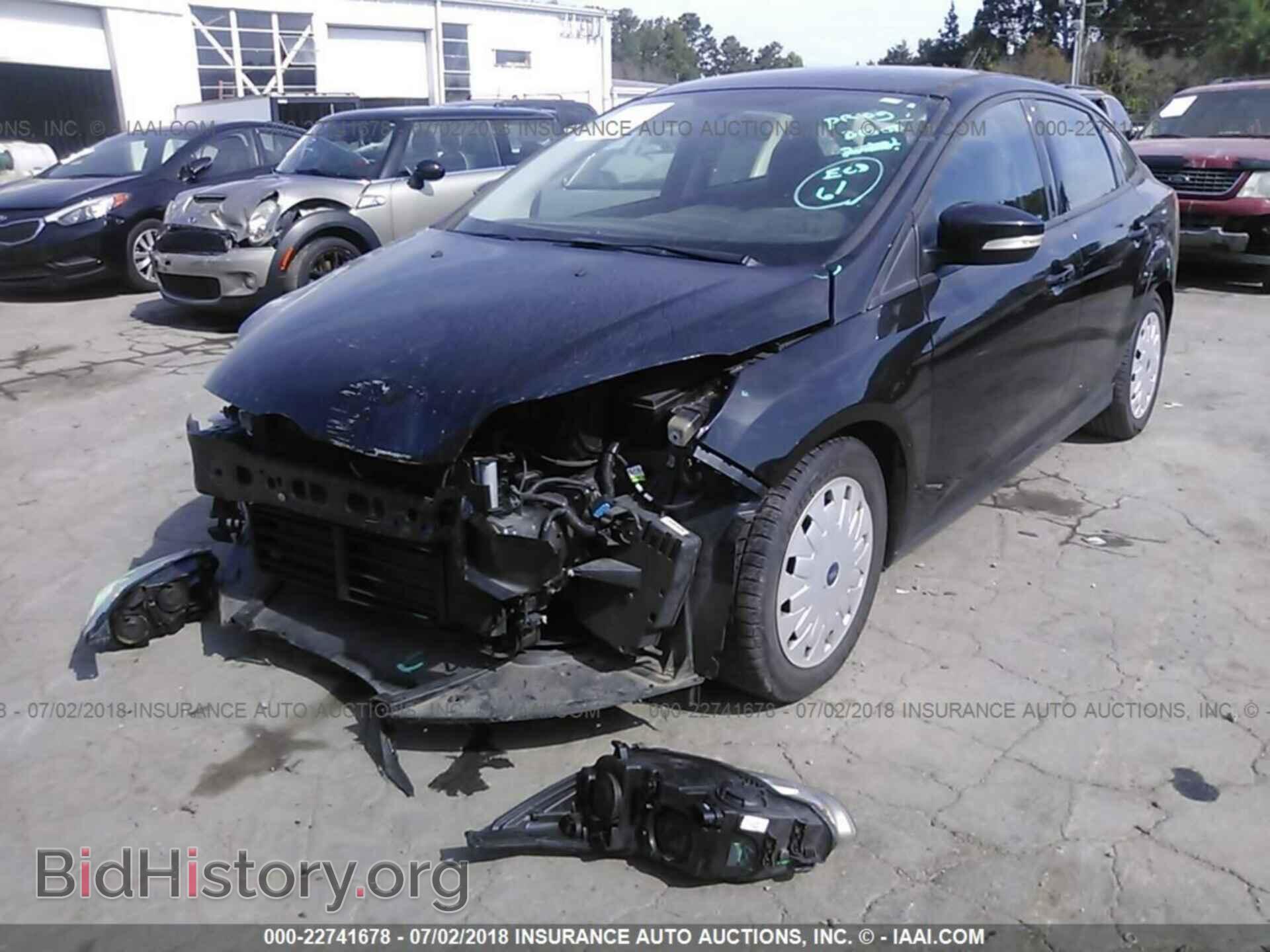 2014 Ford Focus - VIN: 1FADP3F22EL253243 - Photo 2