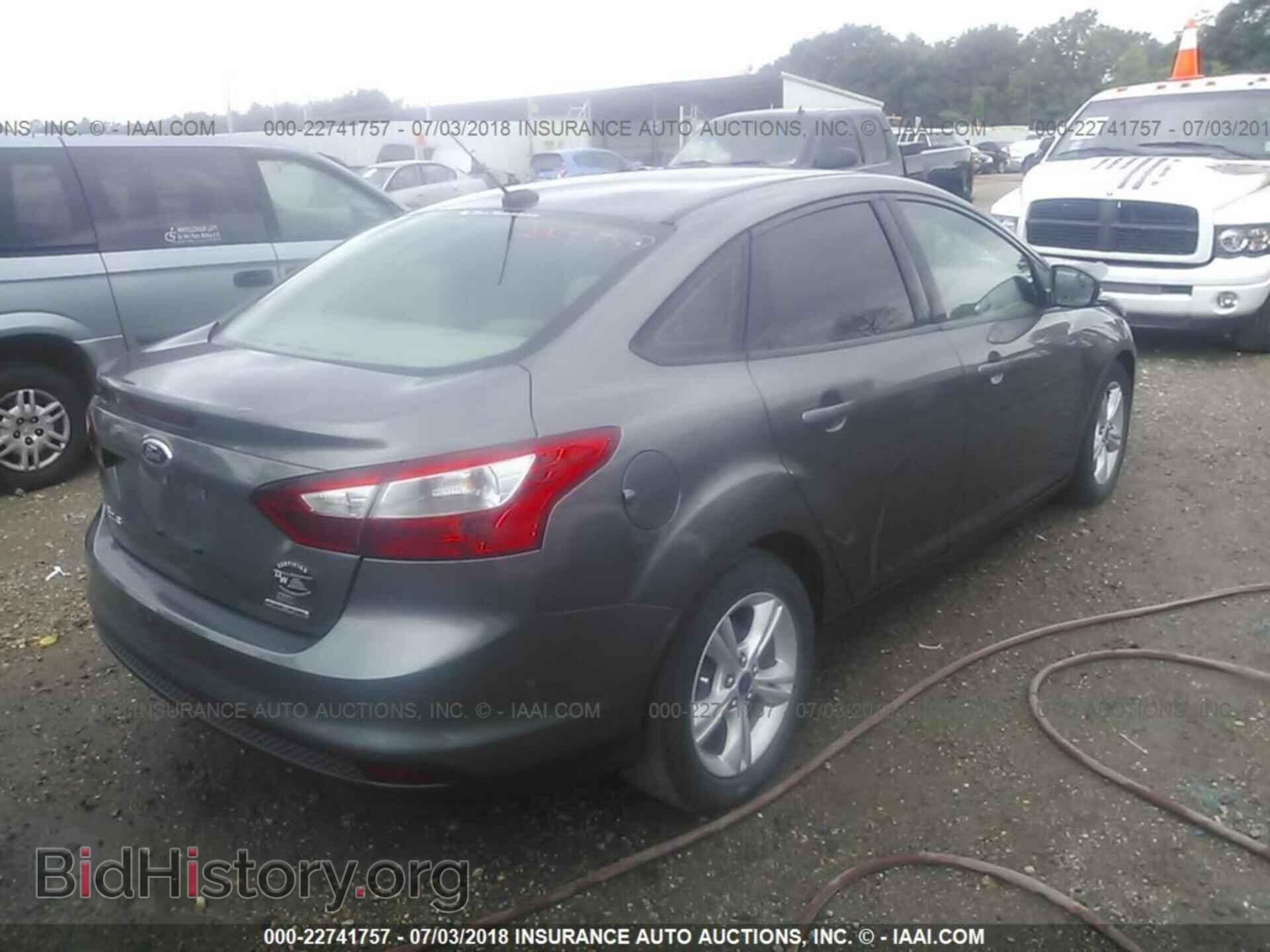 2014 Ford Focus - VIN: 1FADP3F25EL447698 - Photo 4