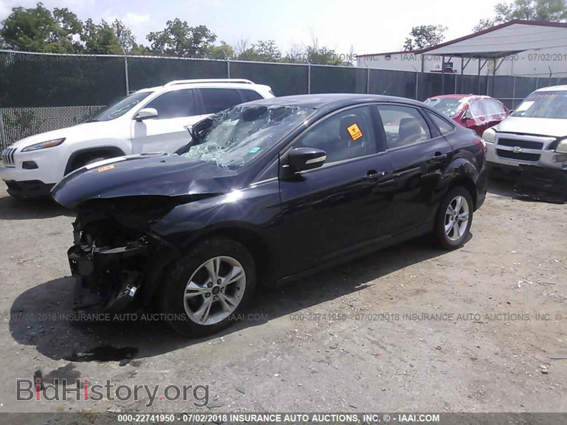 2013 Ford Focus - VIN: 1FADP3F21DL318341 - Photo 2