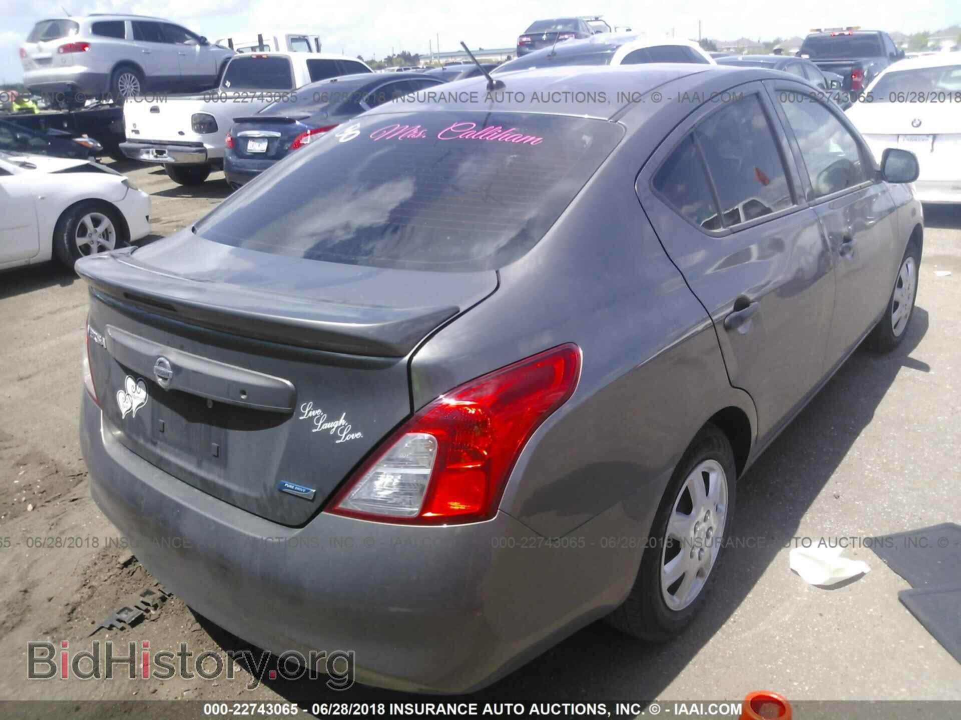 2014 Nissan Versa - VIN: 3N1CN7AP1EL847884 - Фото 4