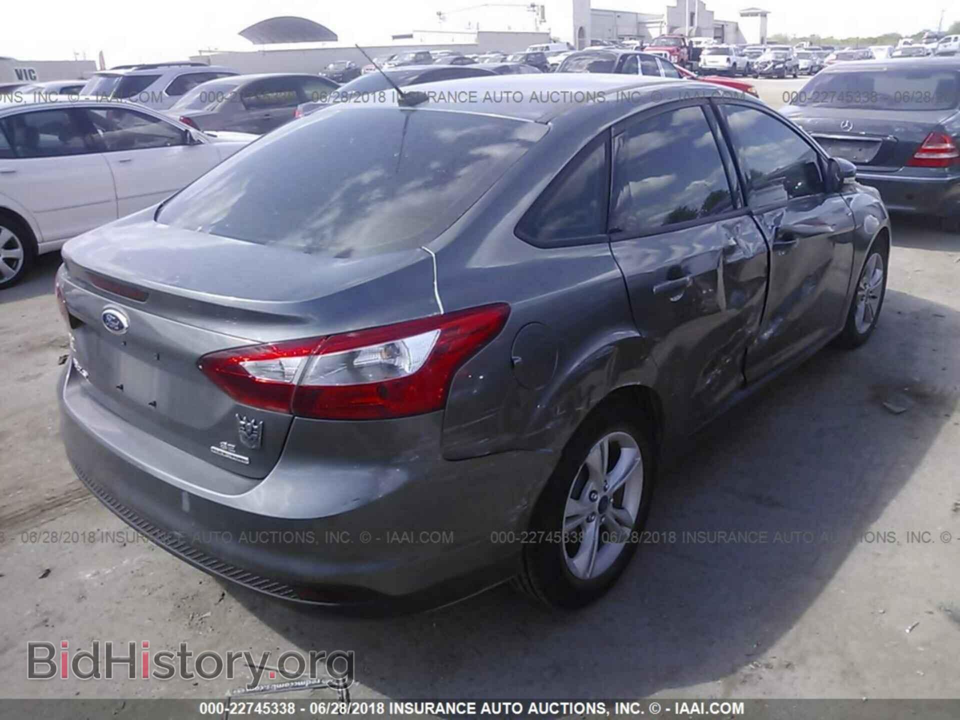 2014 Ford Focus - VIN: 1FADP3F27EL451414 - Photo 4