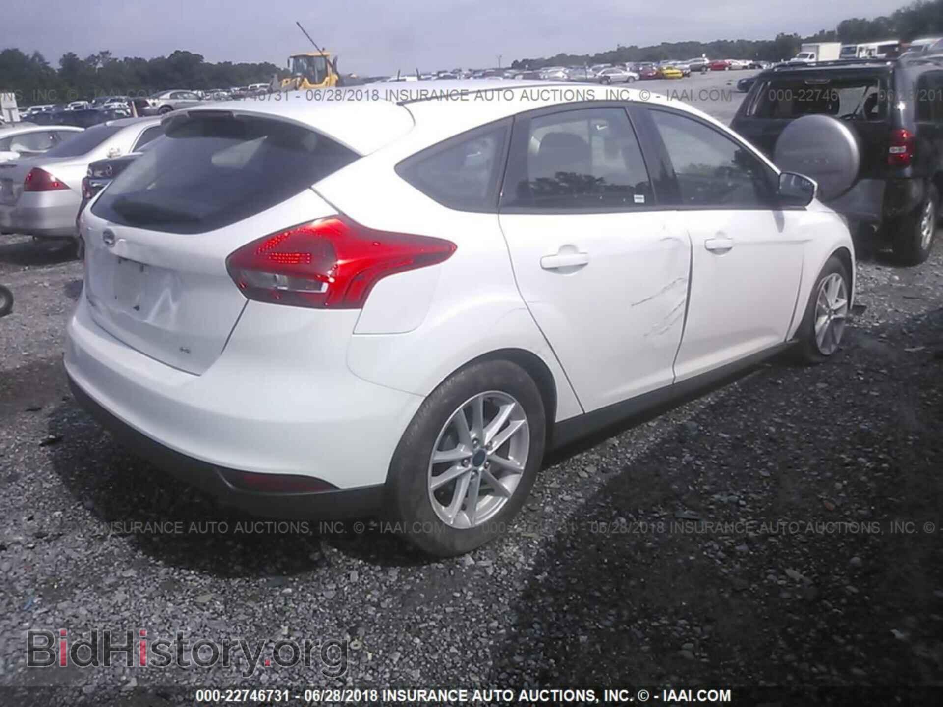2017 Ford Focus - VIN: 1FADP3K2XHL217651 - Photo 4