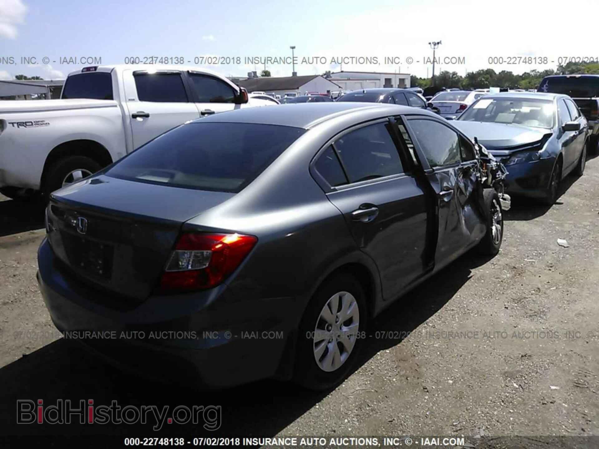 2012 Honda Civic - VIN: 2HGFB2F59CH304691 - Photo 4