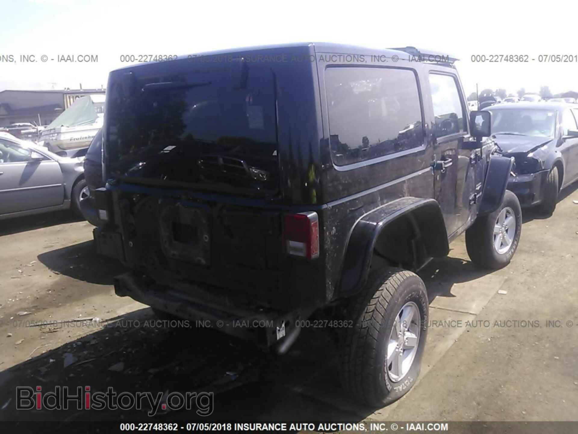 2011 Jeep Wrangler - VIN: 1J4AA5D15BL573473 - Фото 4