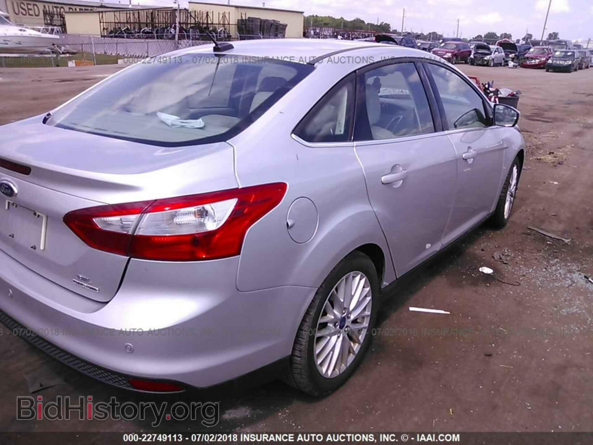2012 Ford Focus - VIN: 1FAHP3H2XCL448681 - Photo 4