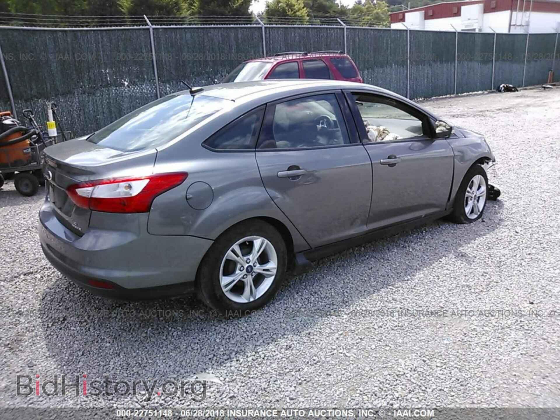 2014 Ford Focus - VIN: 1FADP3F28EL258656 - Фото 4