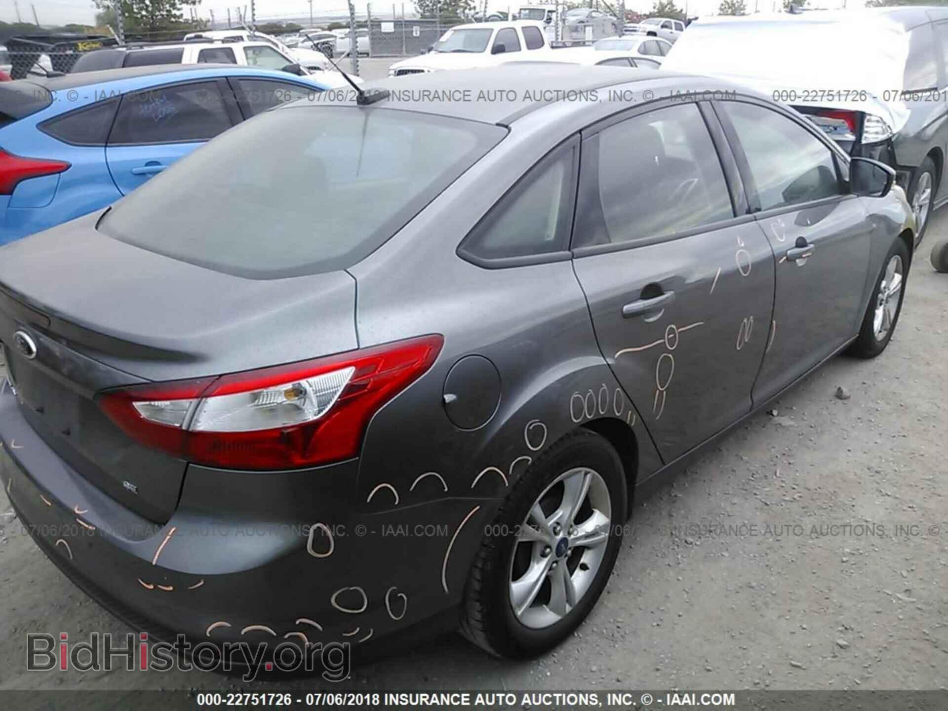 2014 Ford Focus - VIN: 1FADP3F22EL238175 - Photo 4