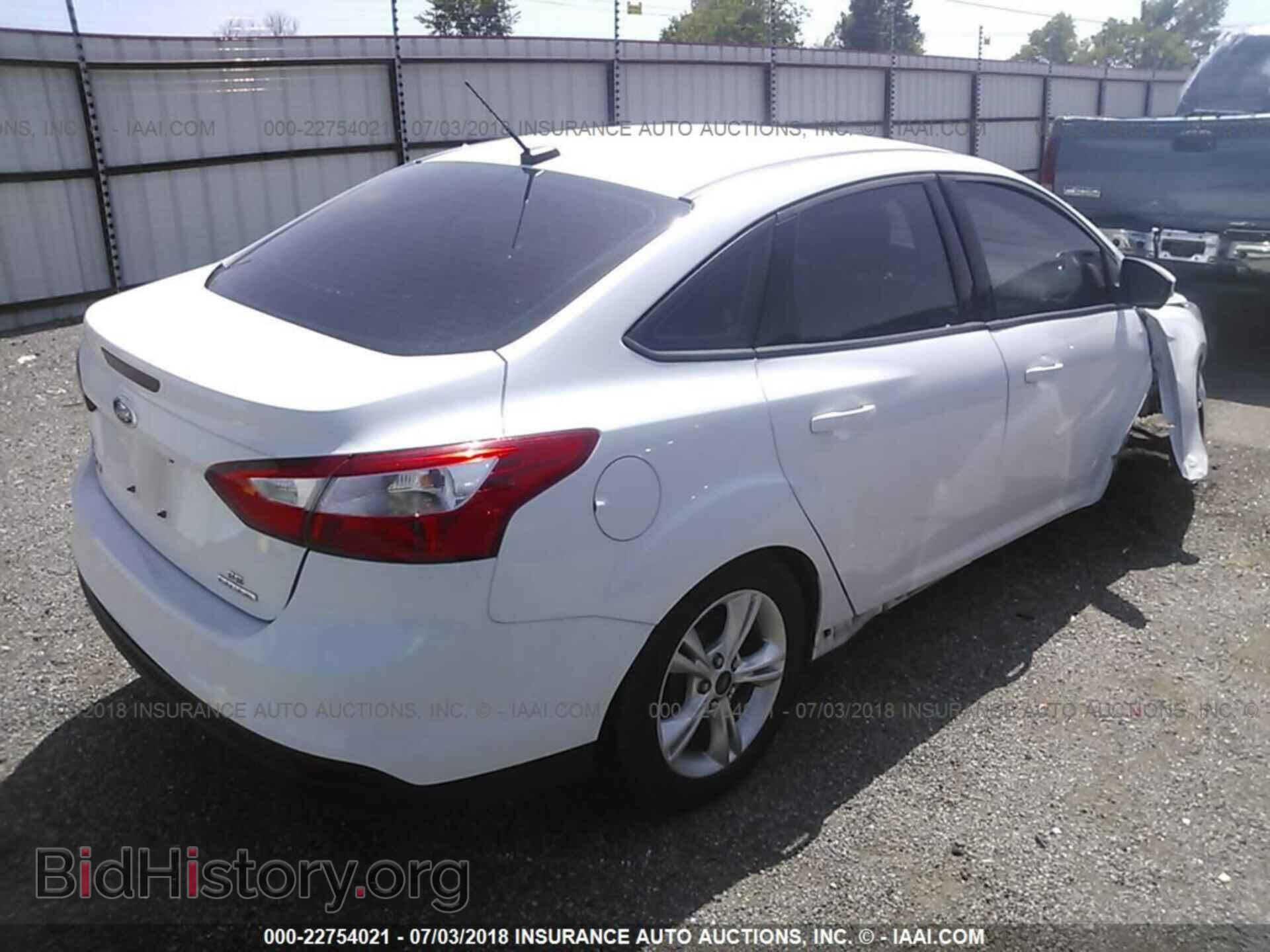 2014 Ford Focus - VIN: 1FADP3F22EL196669 - Photo 4