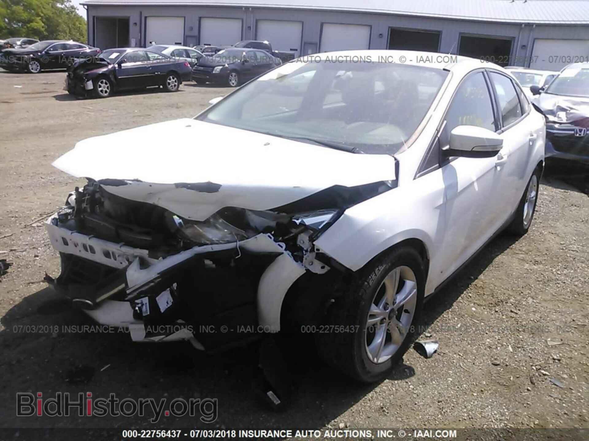 2014 Ford Focus - VIN: 1FADP3F28EL142938 - Photo 2