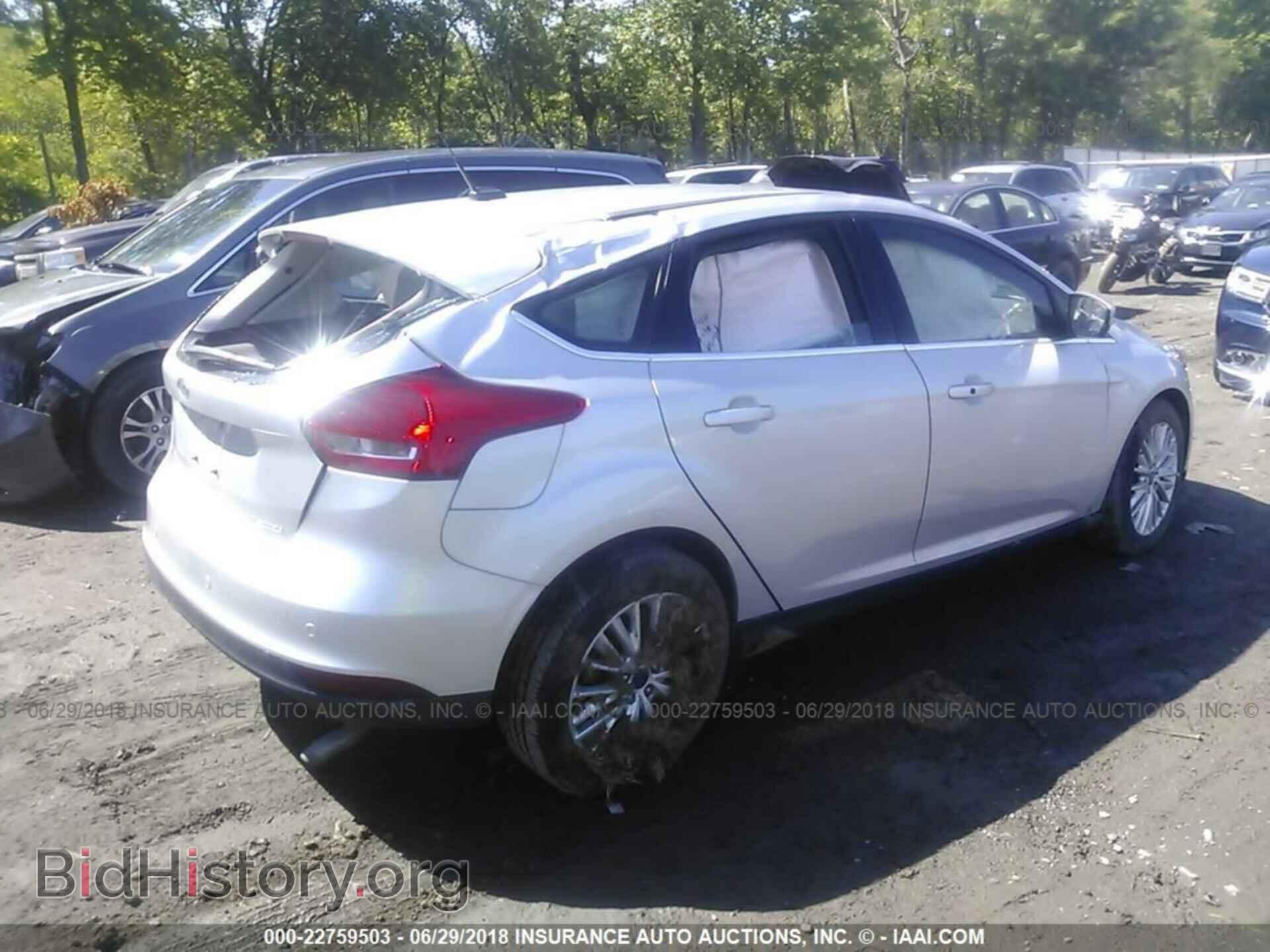 2016 Ford Focus - VIN: 1FADP3N23GL302860 - Фото 4