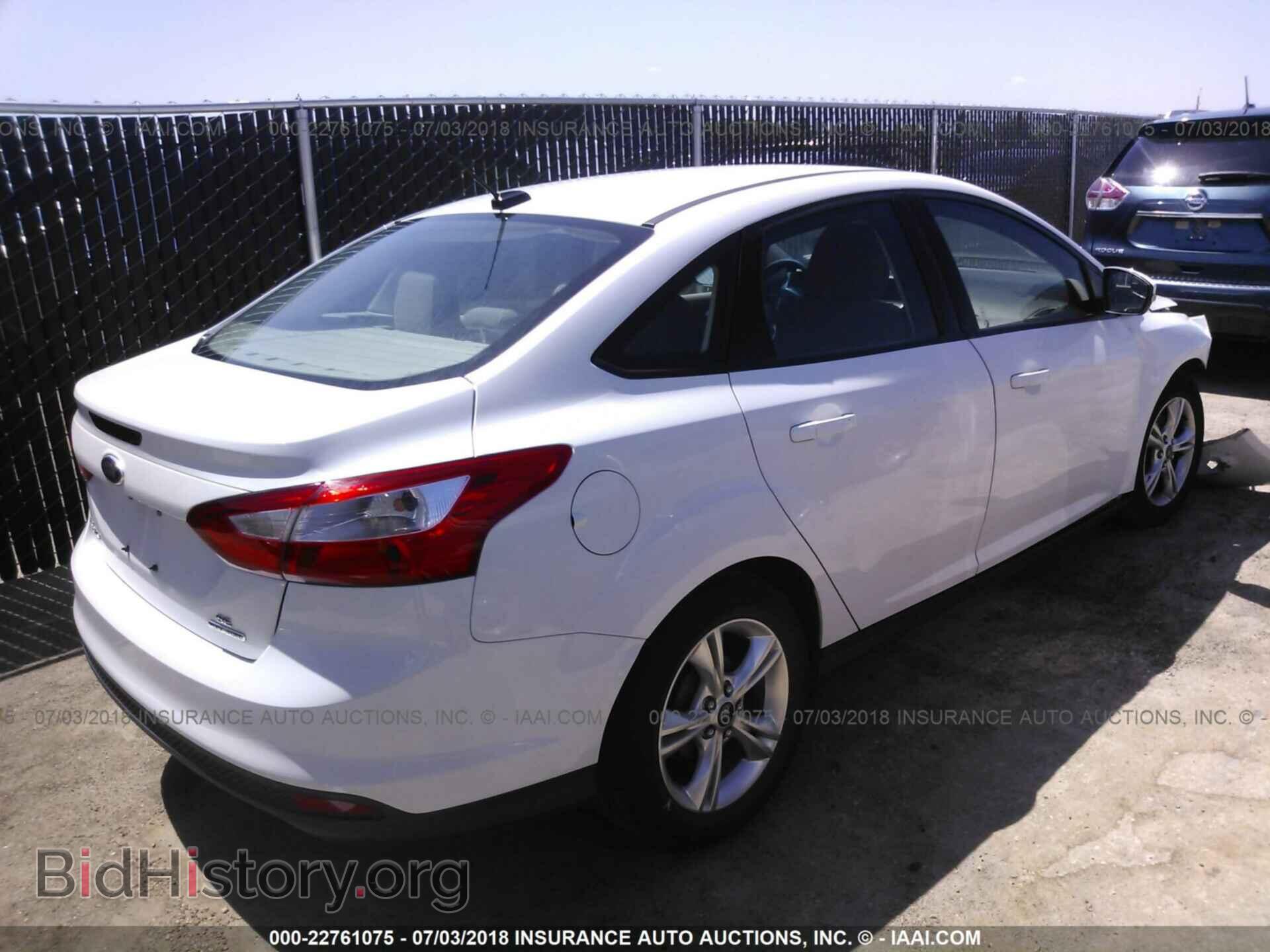 2014 Ford Focus - VIN: 1FADP3F22EL282466 - Photo 4
