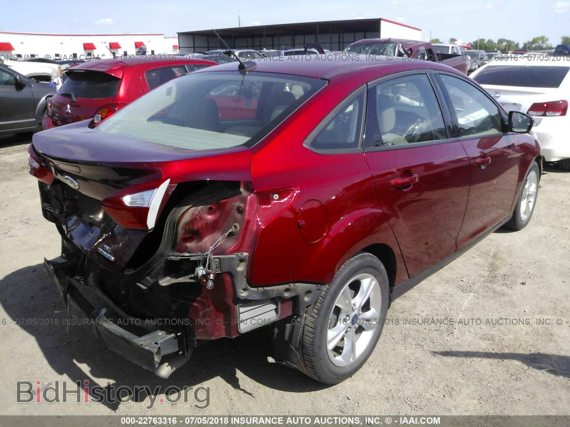 2014 Ford Focus - VIN: 1FADP3F22EL155636 - Photo 4