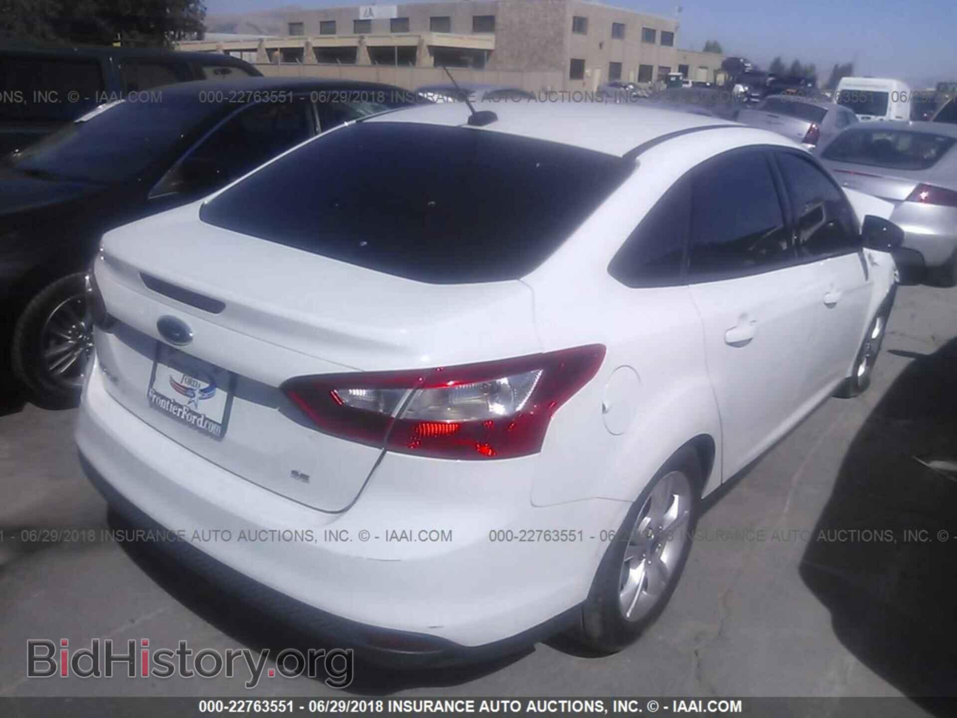 2014 Ford Focus - VIN: 1FADP3F23EL224849 - Photo 4