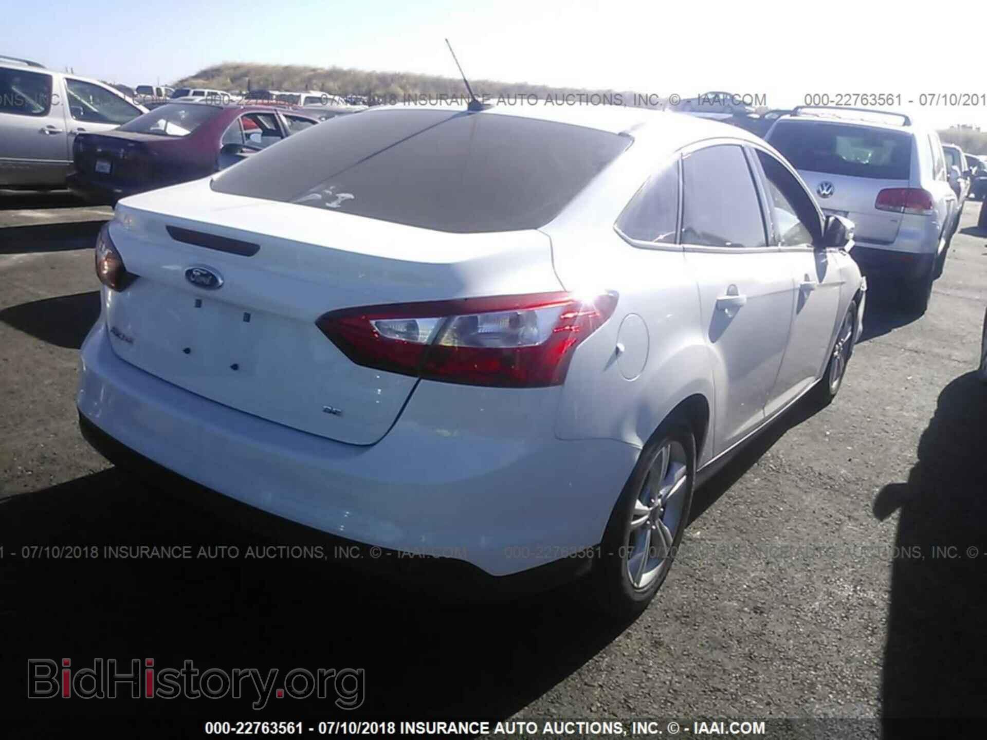 2014 Ford Focus - VIN: 1FADP3F23EL264638 - Photo 4