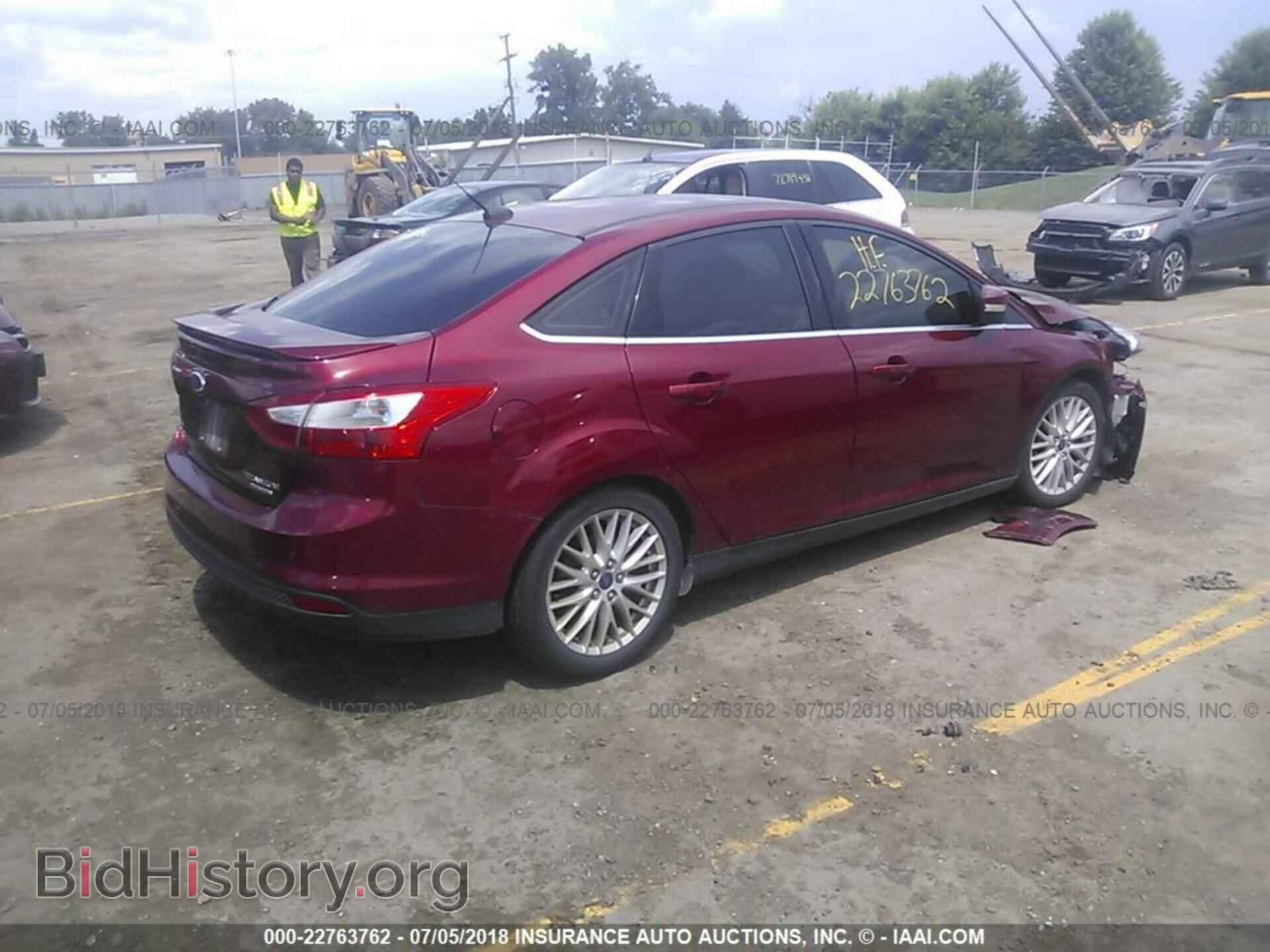 2014 Ford Focus - VIN: 1FADP3J21EL128788 - Photo 4