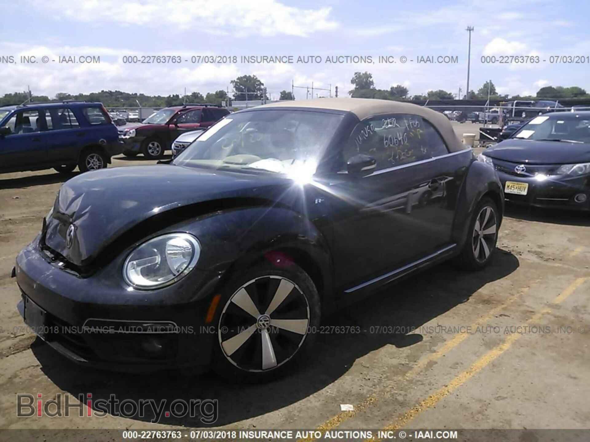 2014 Volkswagen Beetle - VIN: 3VW8T7AT9EM806285 - Фото 2