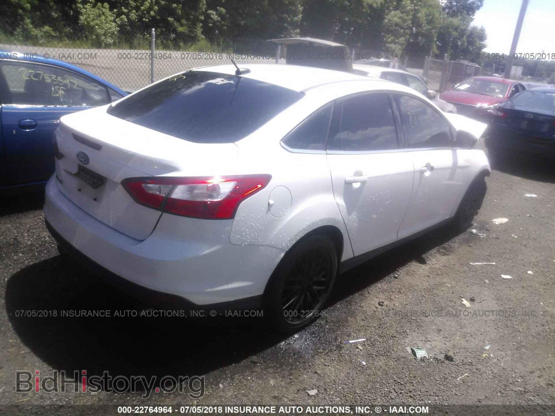 2012 Ford Focus - VIN: 1FAHP3H24CL298955 - Photo 4