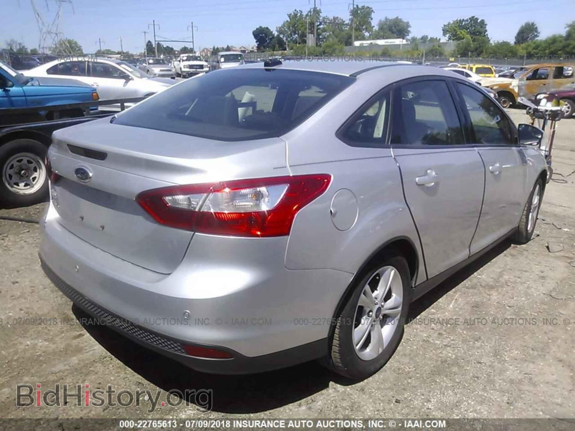 2014 Ford Focus - VIN: 1FADP3F28EL257538 - Фото 4