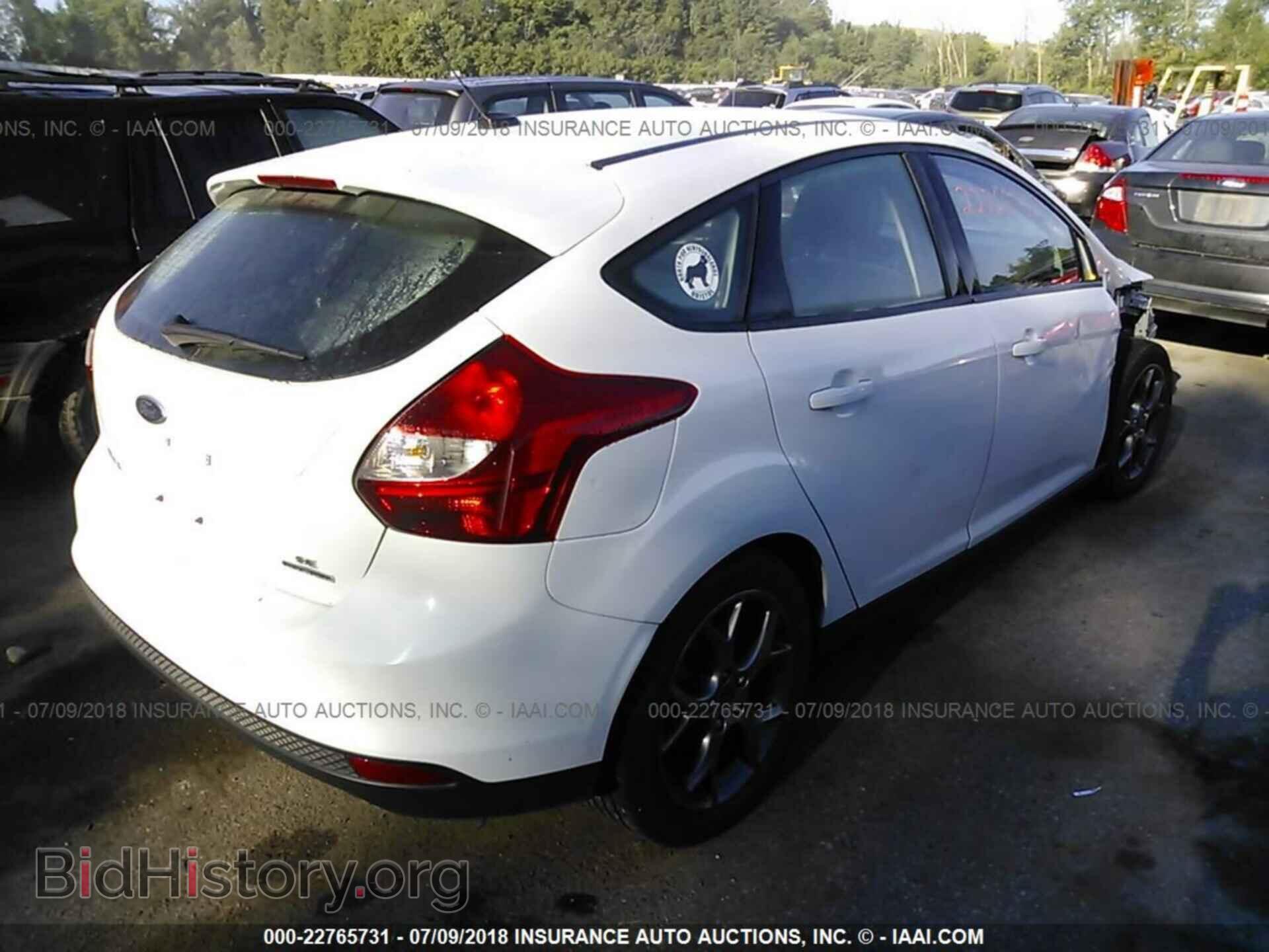 2014 Ford Focus - VIN: 1FADP3K25EL154907 - Photo 4