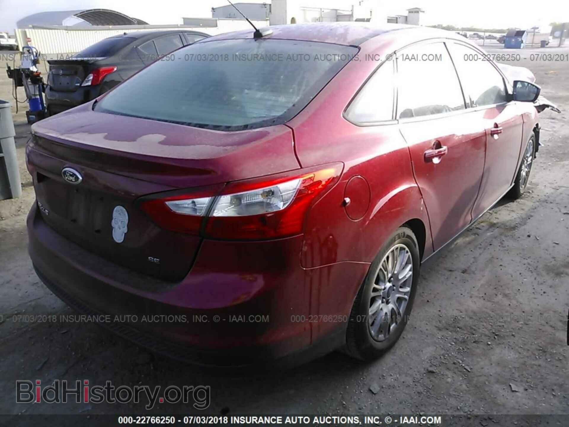 2012 Ford Focus - VIN: 1FAHP3F21CL121041 - Фото 4